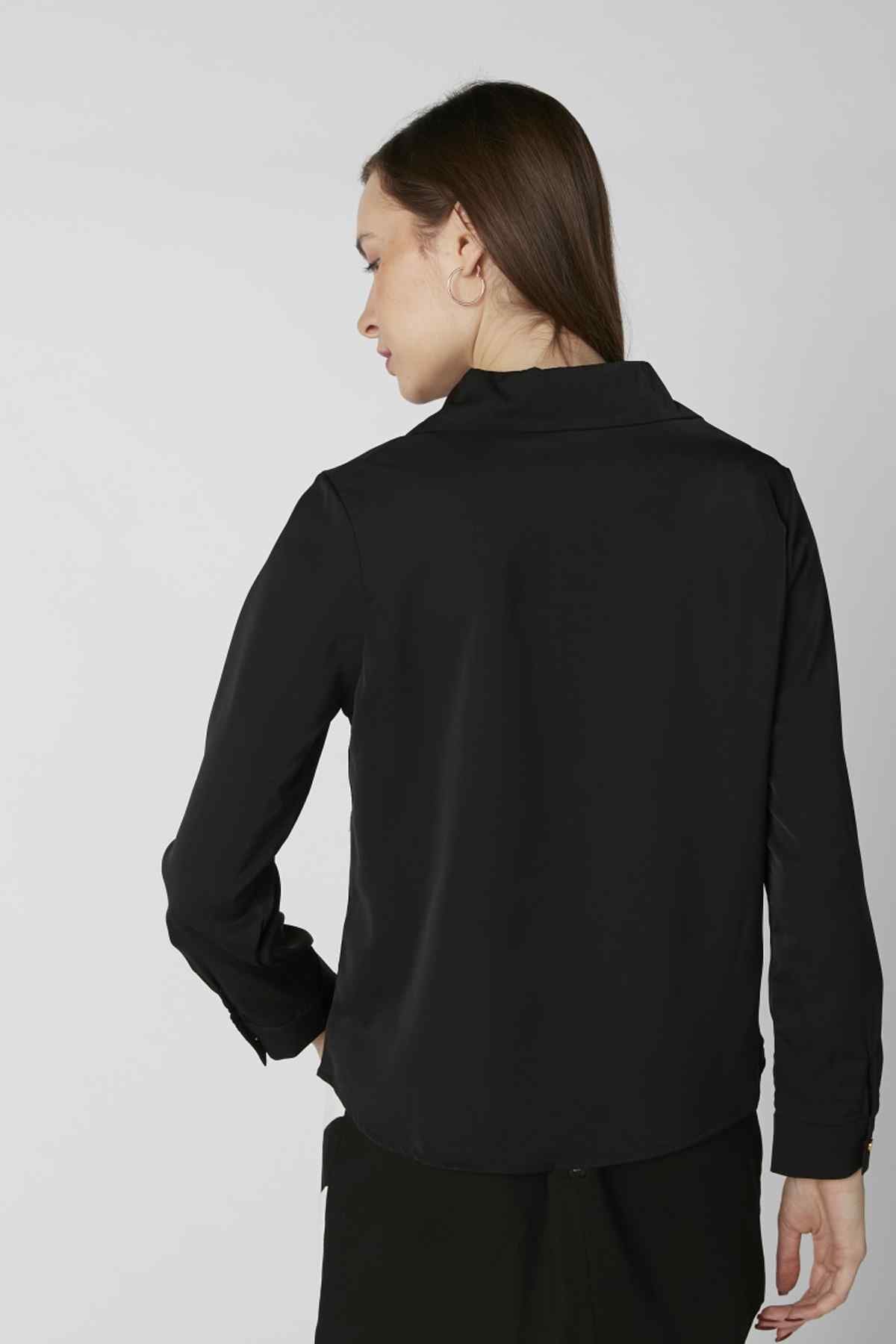 Black long-sleeve shirt with high collar and center-back seam