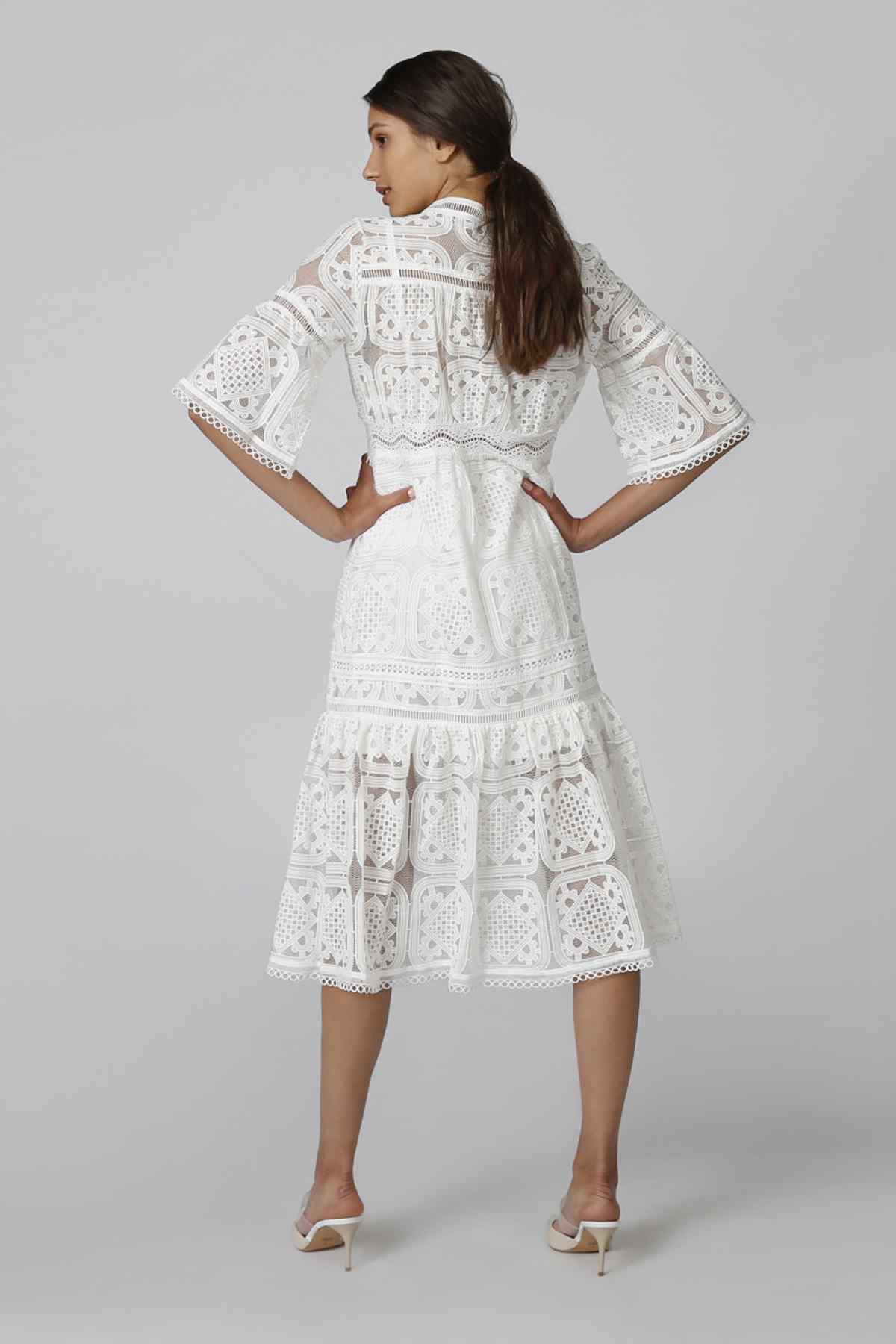 White lace tiered midi dress with back yoke detail and 3/4 bell sleeves