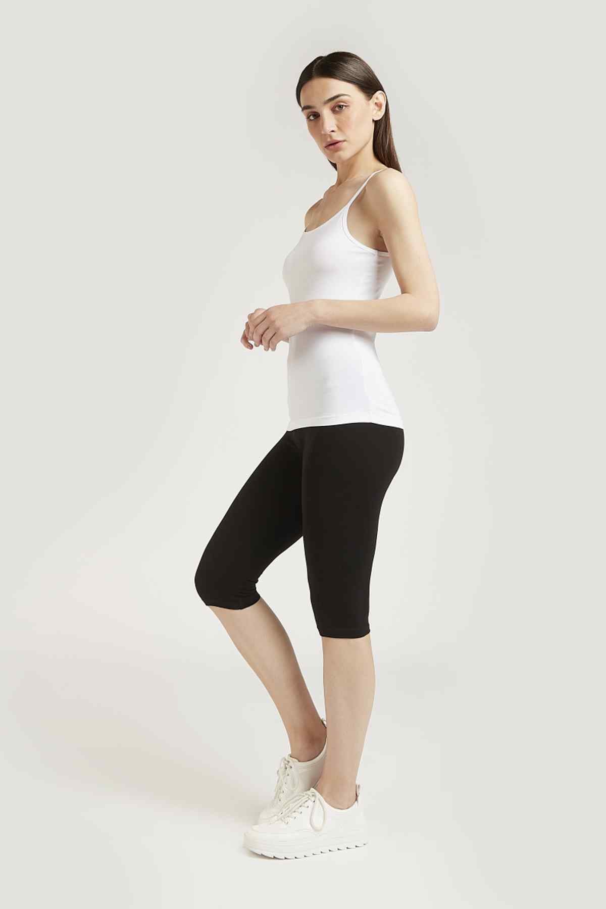 Black capri leggings shown in side view