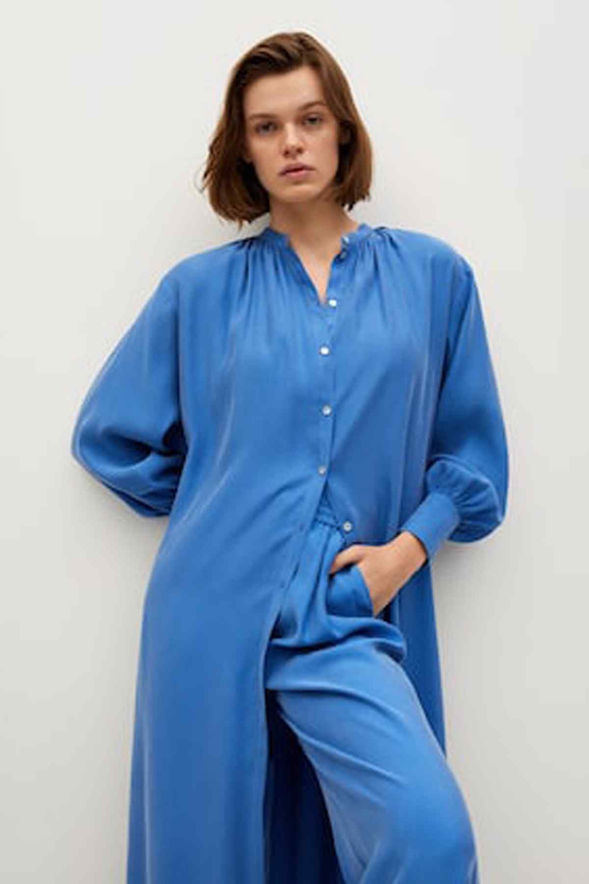 Blue button-front midi dress with tie belt and long sleeves, side slit
