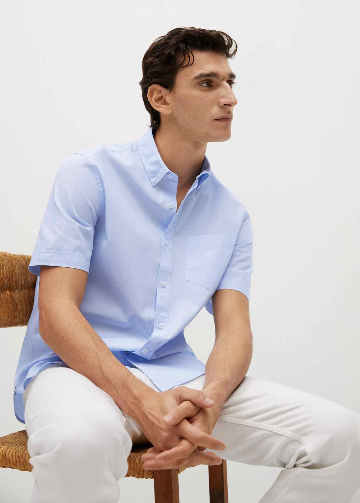 Men's sky blue short-sleeve button-up shirt with pointed collar and chest pocket