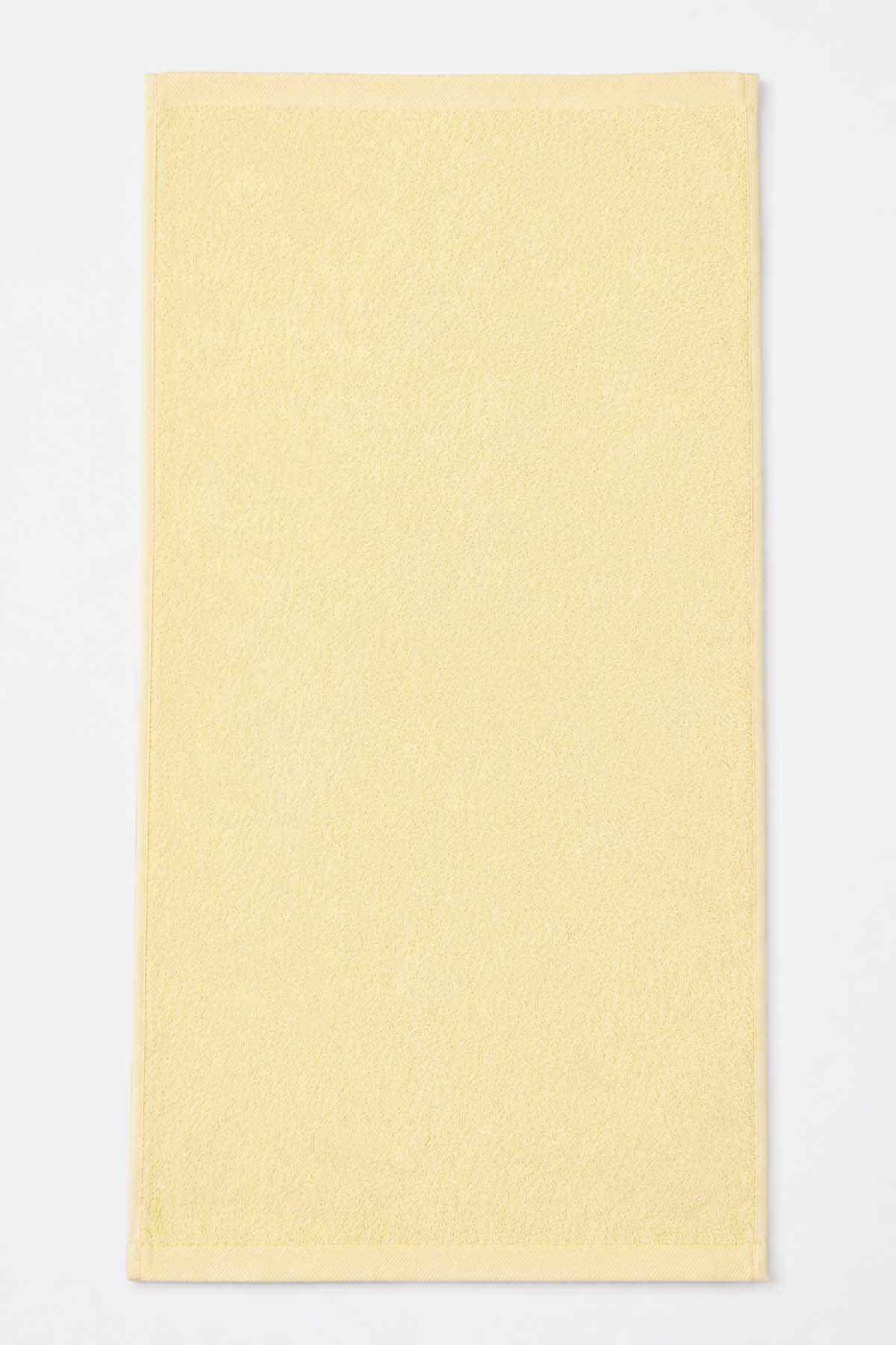 BABYSHOP yellow towel, plain front with no visible embroidery