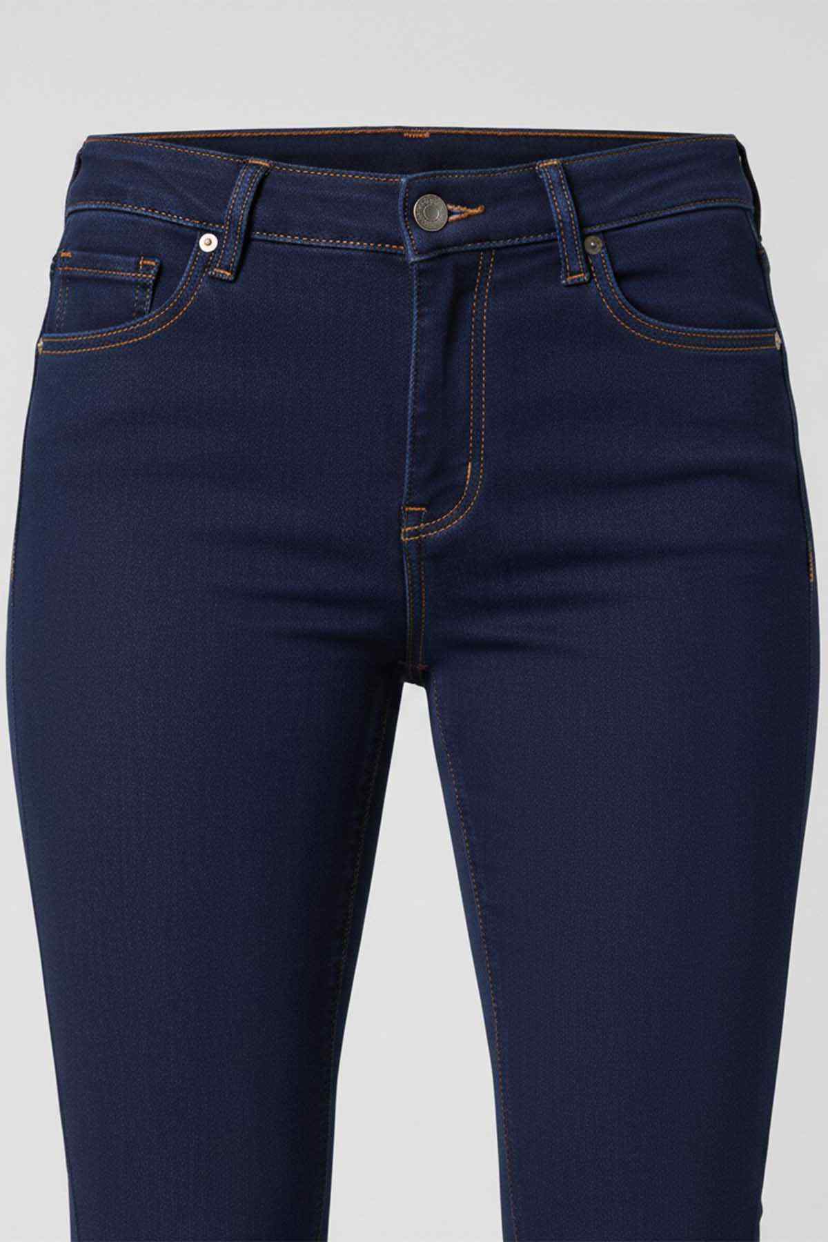 Navy blue jeans front, five-pocket styling with button waistband and contrast seams