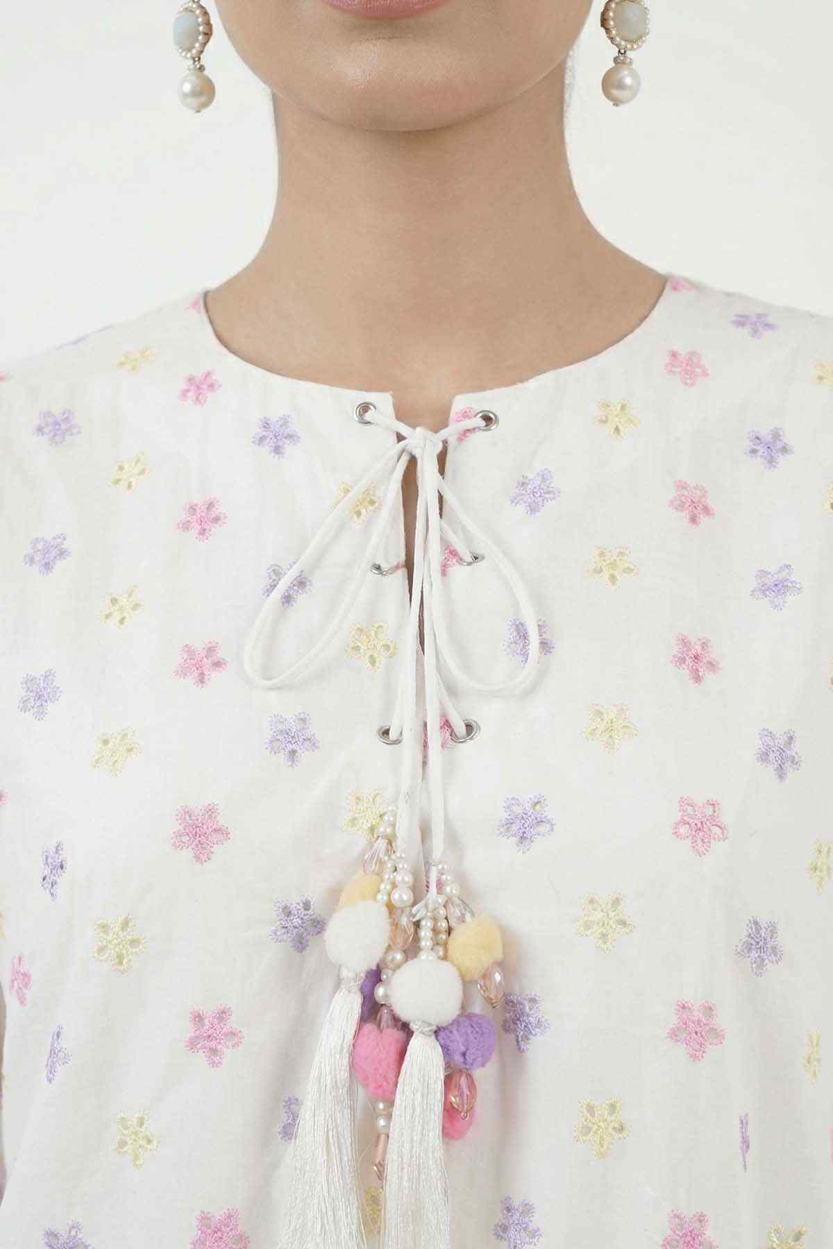 Women’s printed kurta neckline with ribbon tie and tassel pendant embellishment