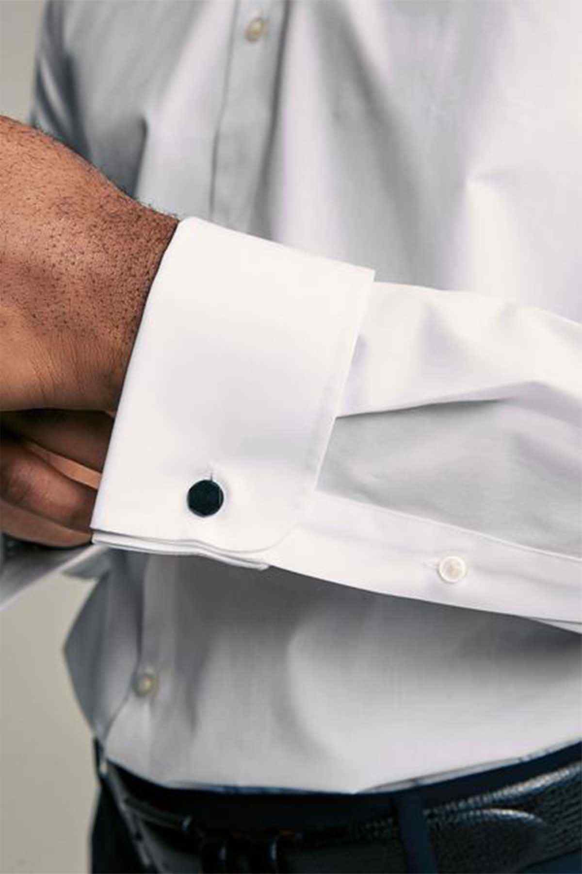 White dress shirt cuff with single button detail, close-up