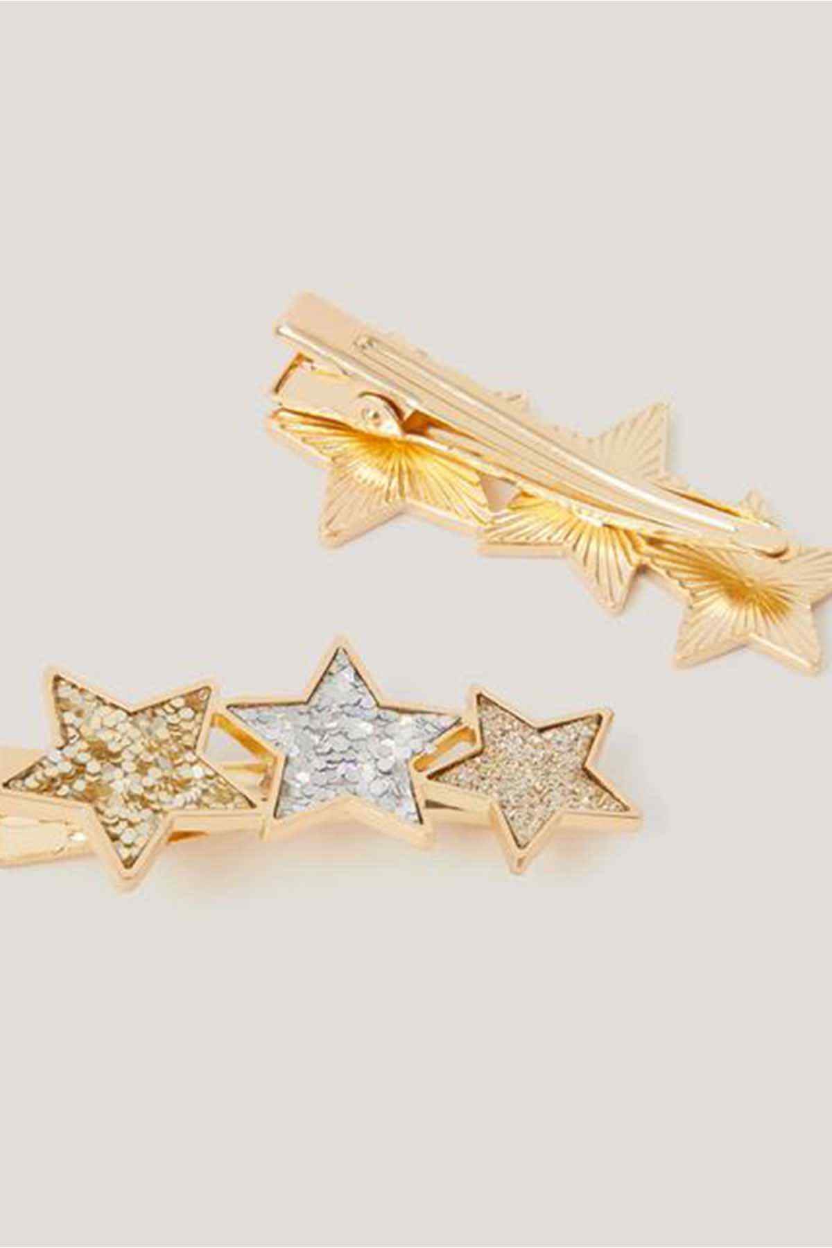 Gold-tone star hair clips with glitter rhinestones and a barrette-style clasp