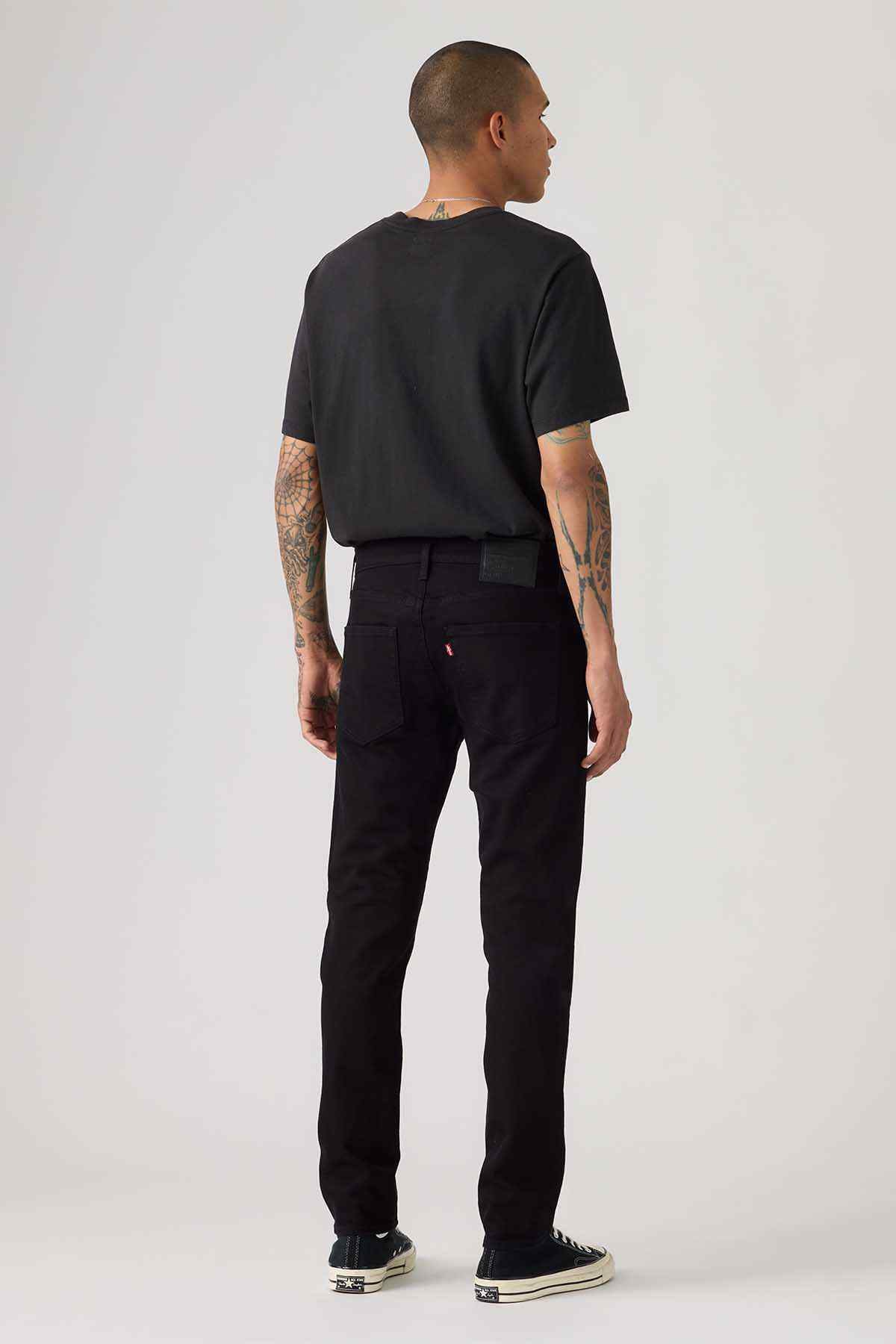 Men's black denim jeans with back pockets and straight leg