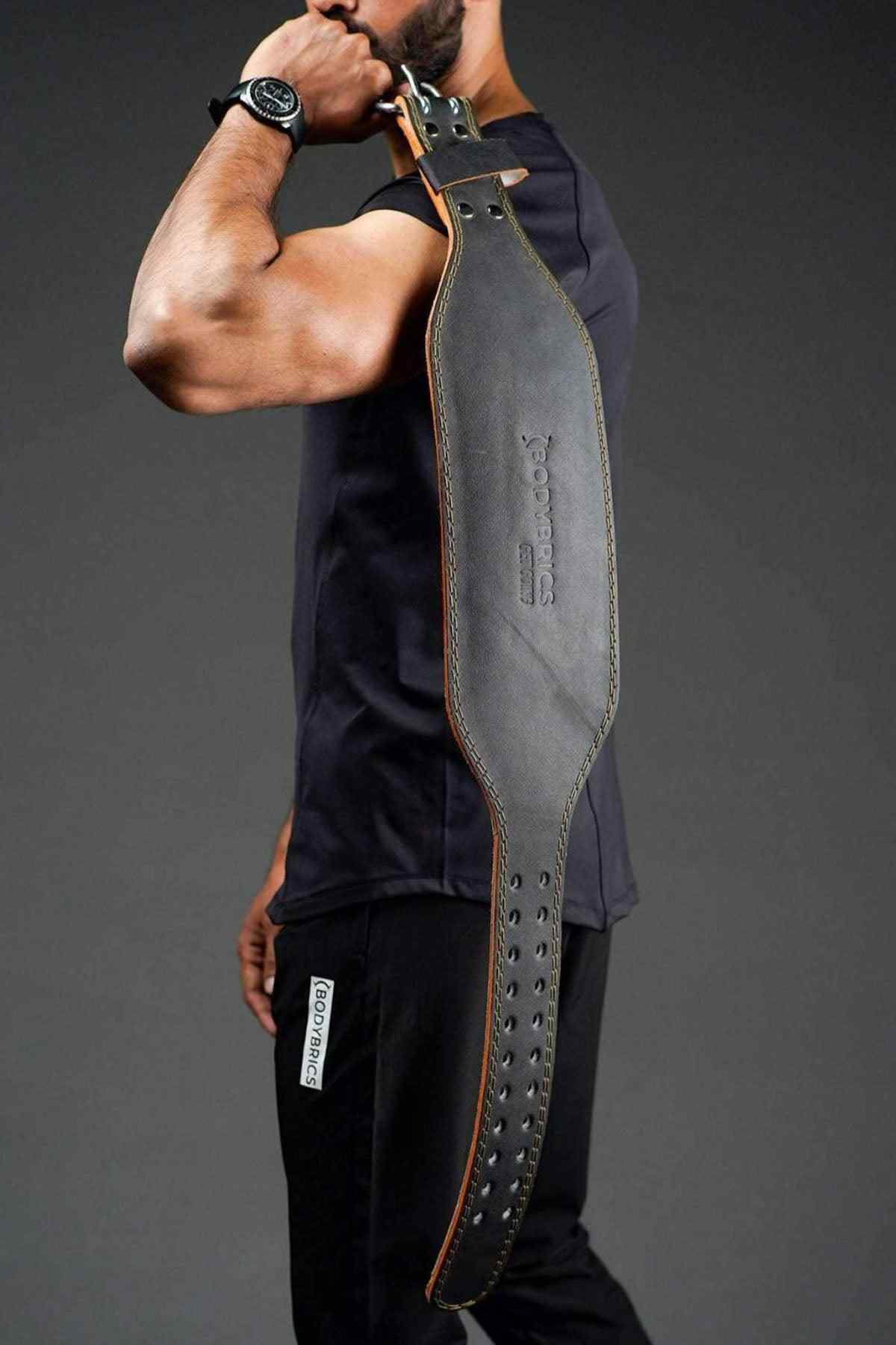 Black compression pants with long gray side panel and orange piping