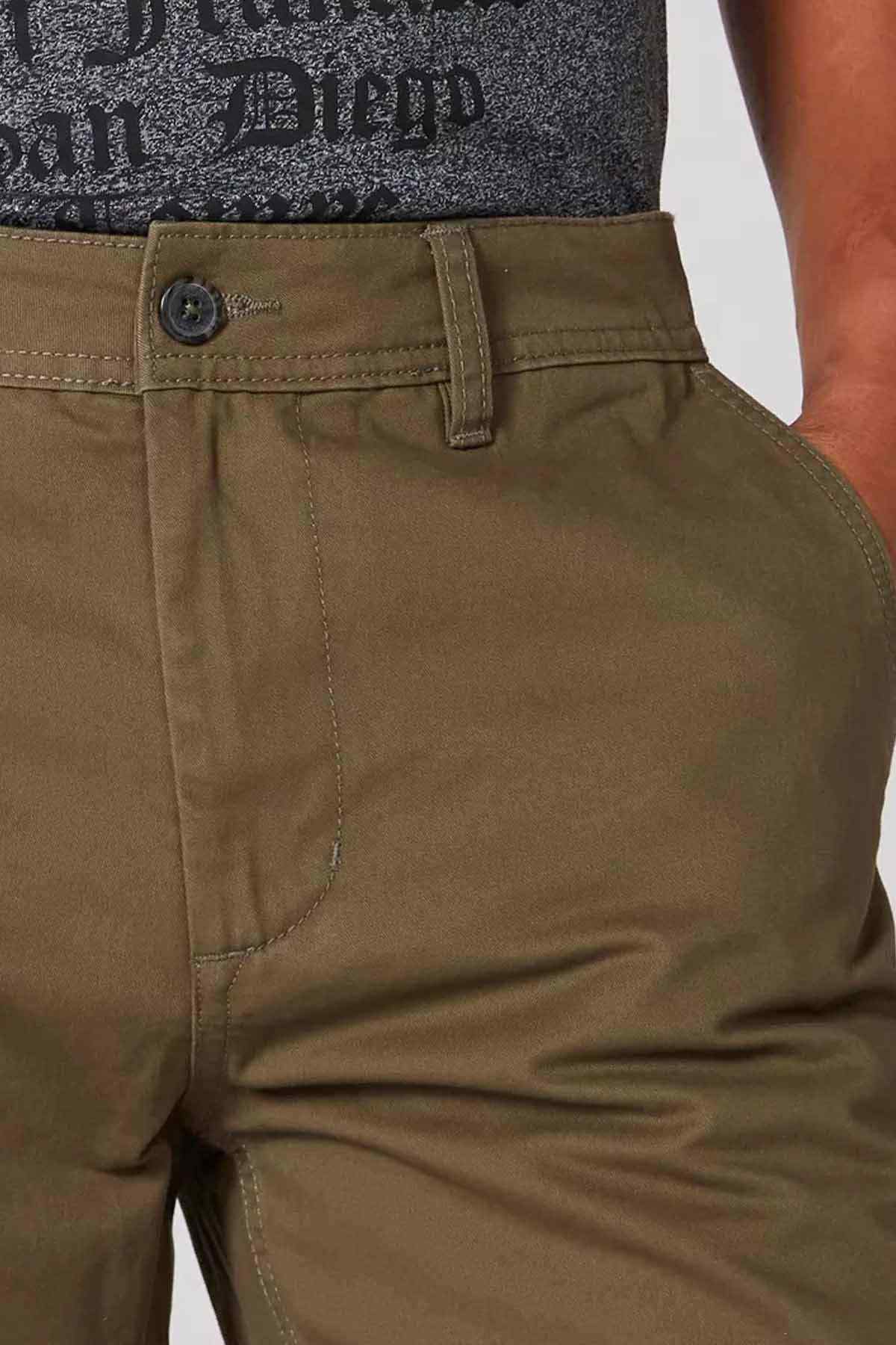 Olive casual shorts with button closure and front seam detail