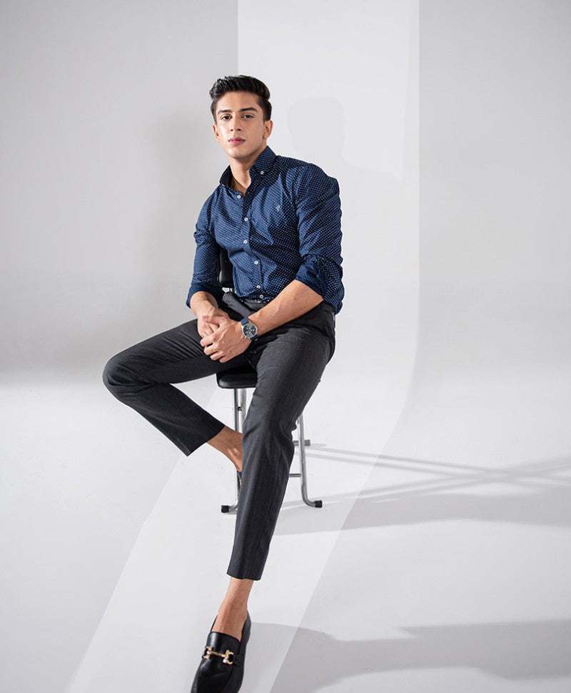 Men's modern-fit blue button-up shirt with small white dot pattern, button-front view