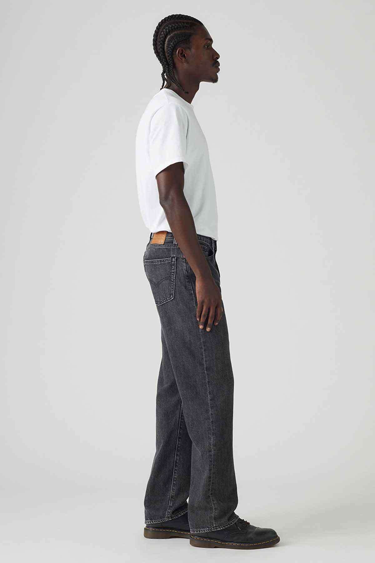 Levi's black denim jeans with straight legs, side seam detail, and back pocket
