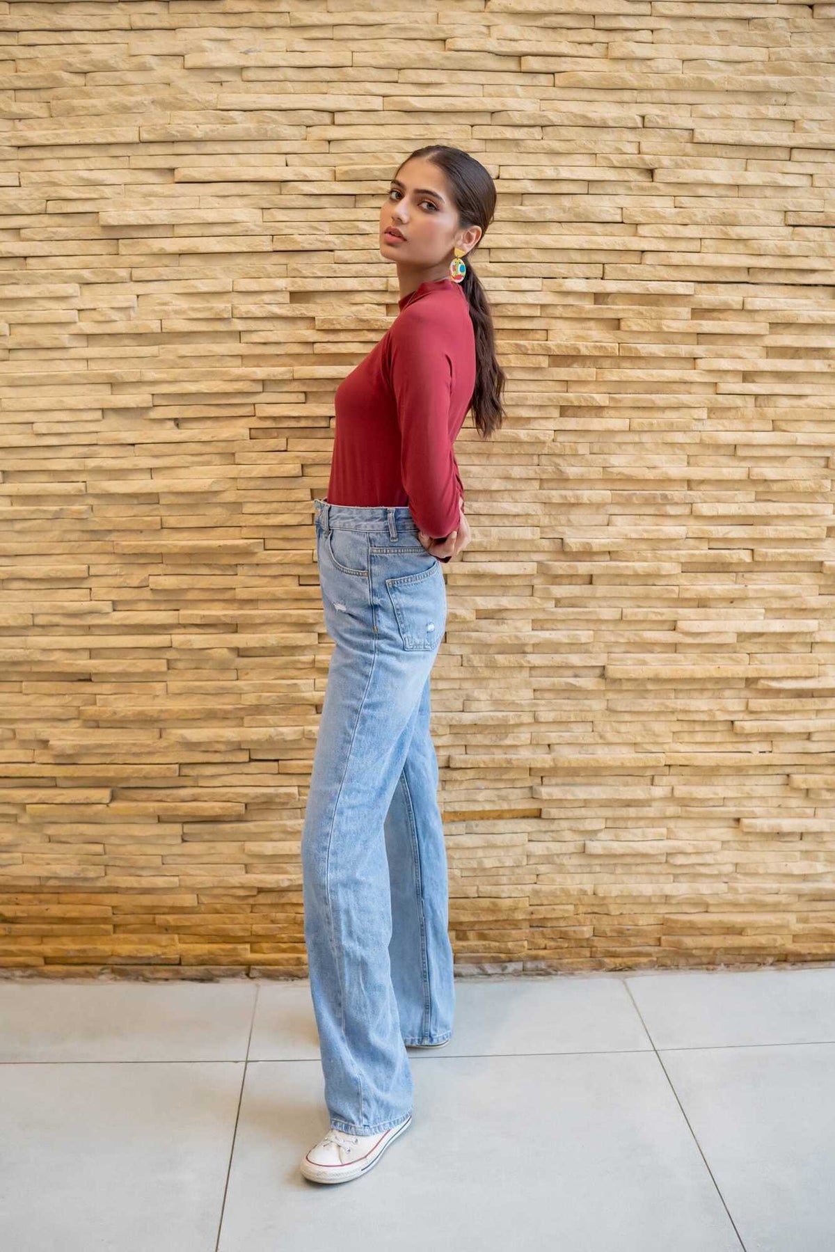 Dhaga maroon mock-neck long-sleeve top shown from side