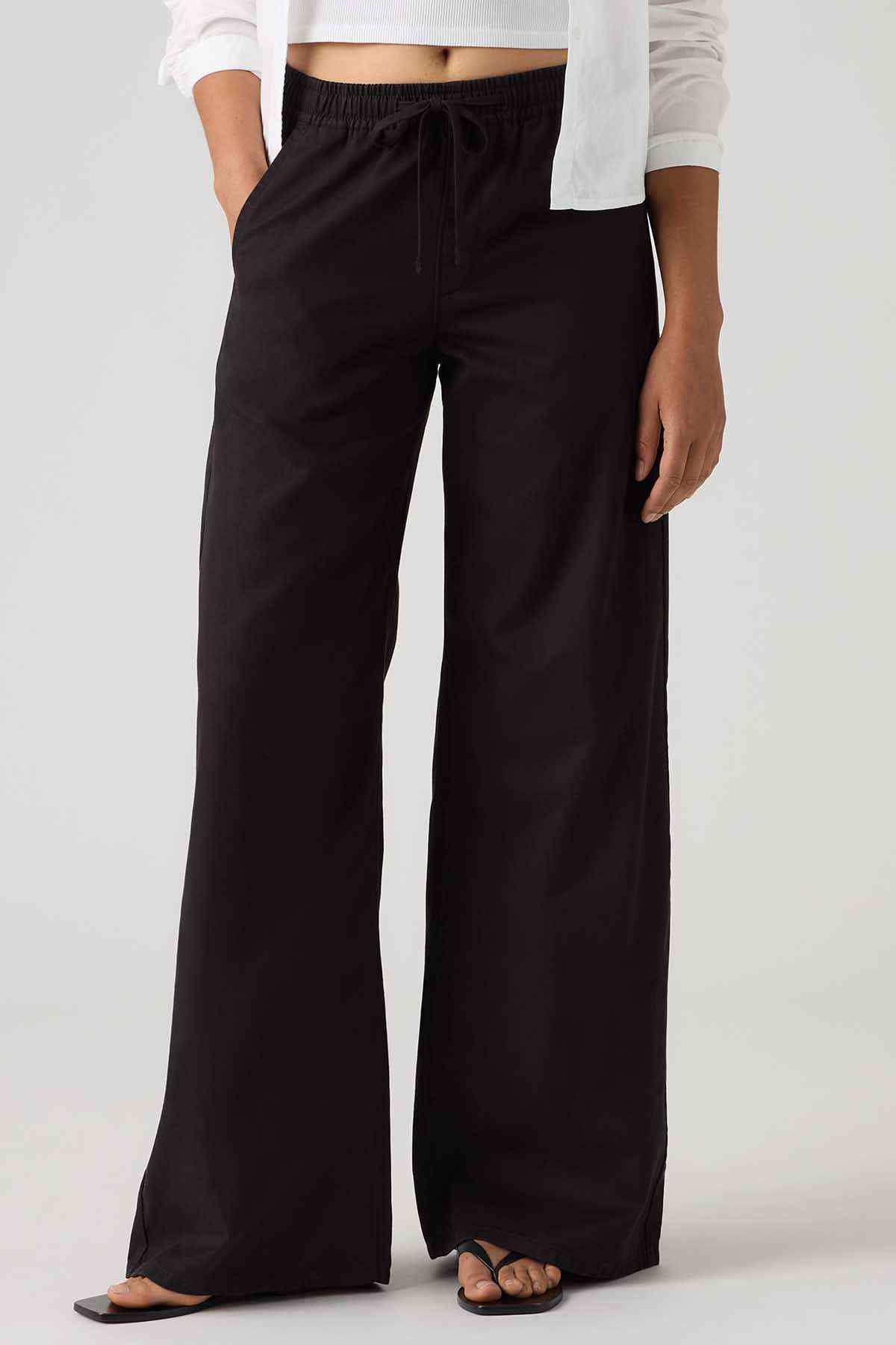 Levi's black wide-leg pants with drawstring waist and wide, flowing legs