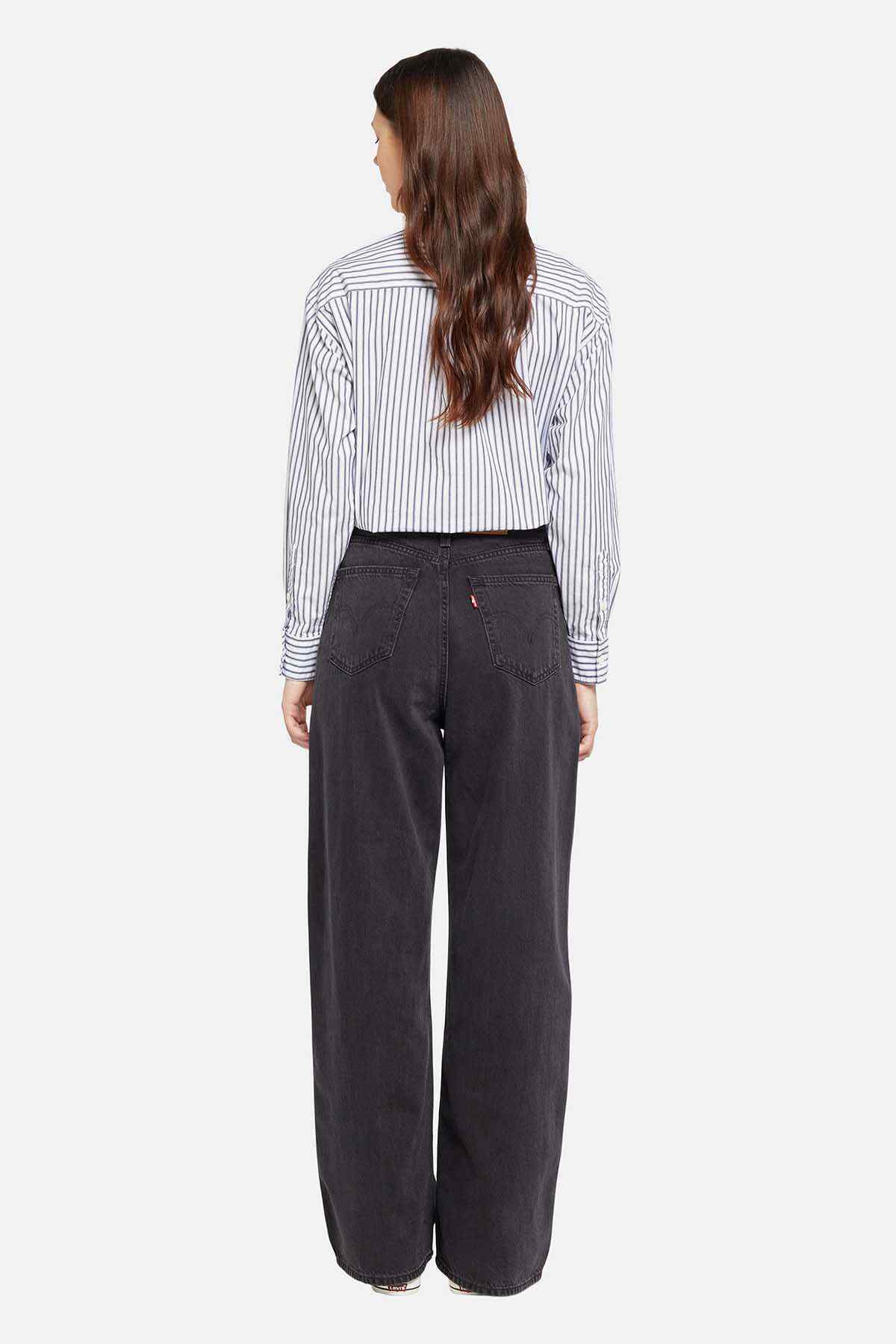 Black wide-leg jeans back view with wide waistband and leg seams