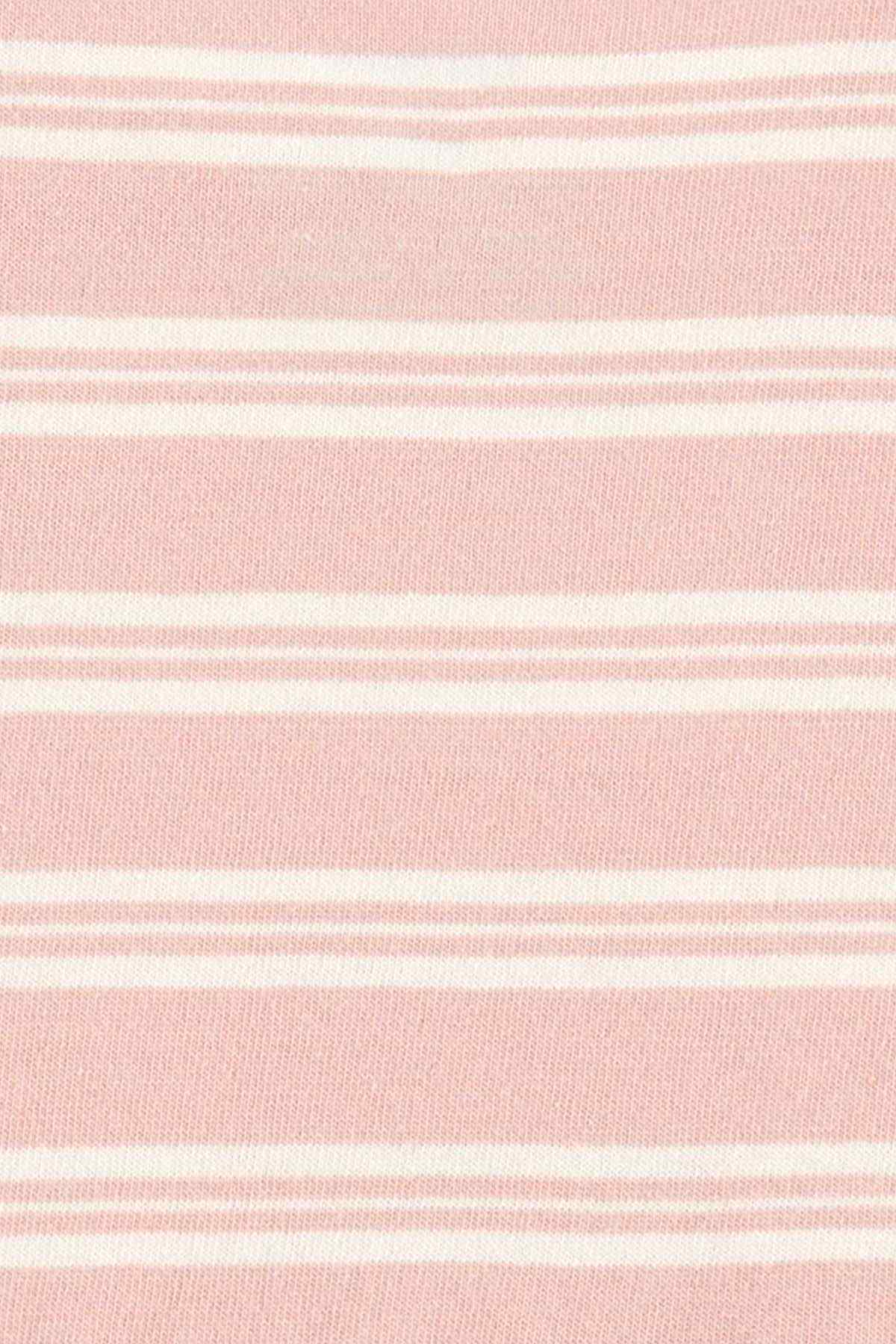 Pink and white horizontal stripe knit fabric close-up