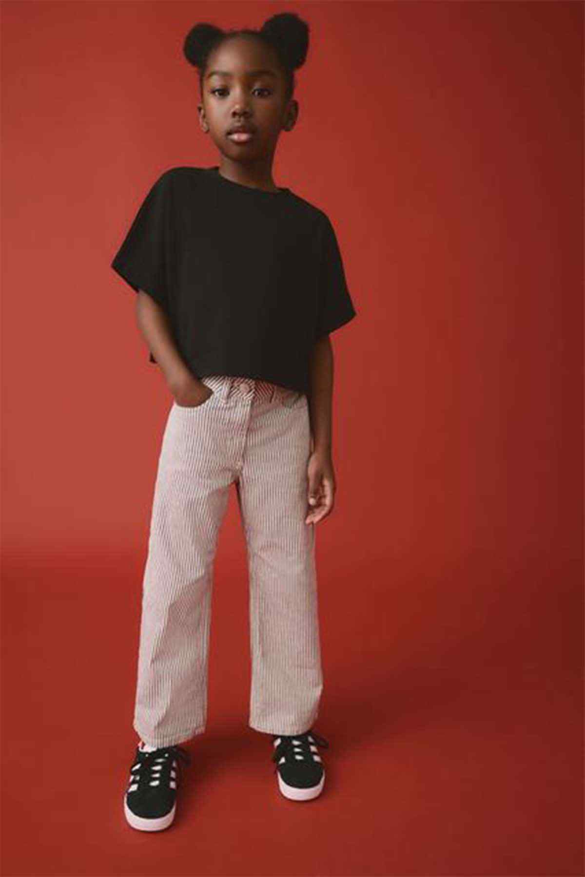 Kids black short-sleeve top and light gray pants