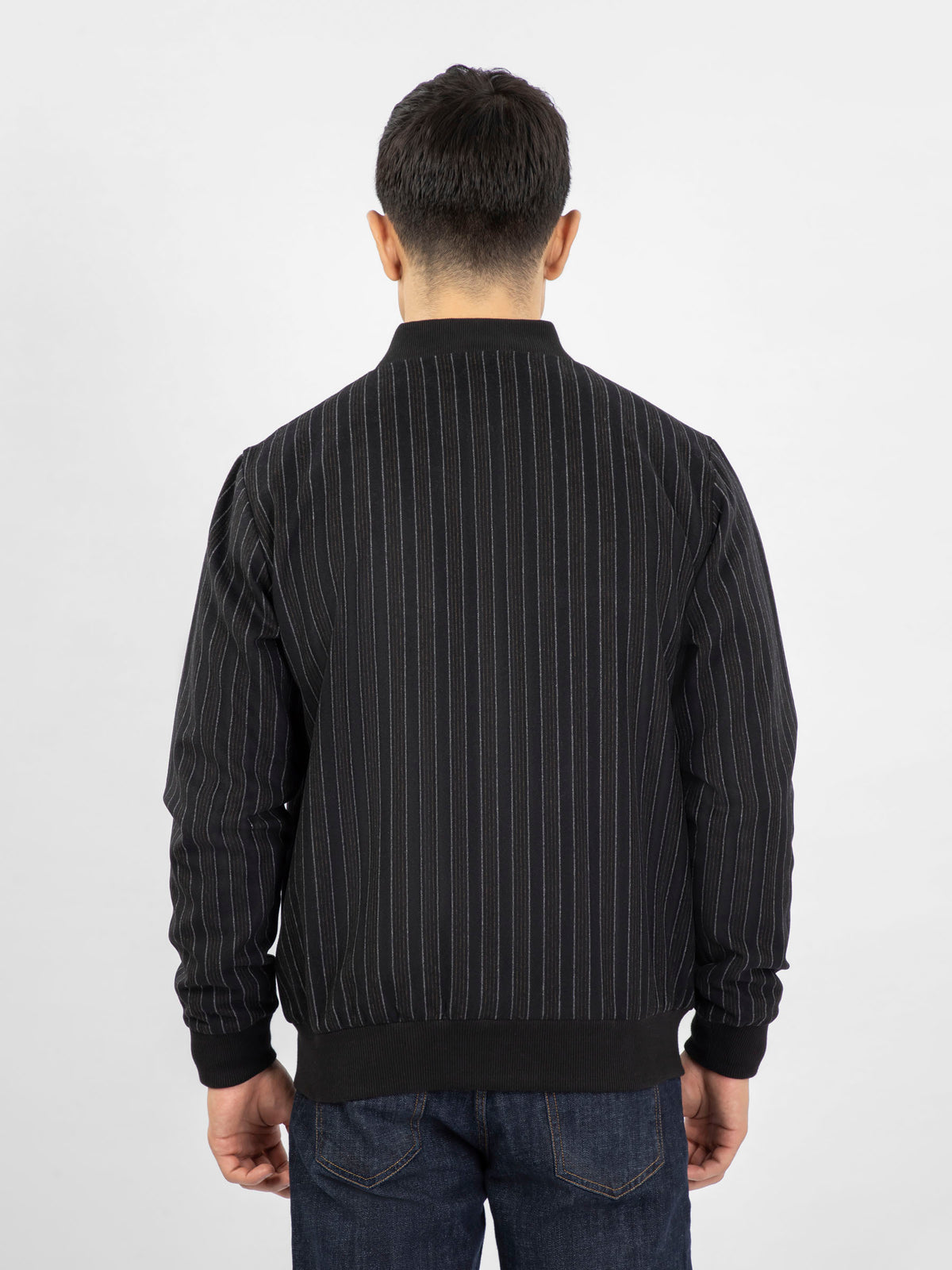 Brumano black vertical-striped zip jacket, back view with stand collar and ribbed trim