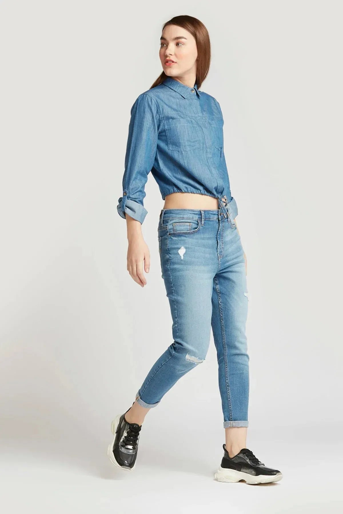 Blue denim button-up shirt with collar, long sleeves, drawstring waist