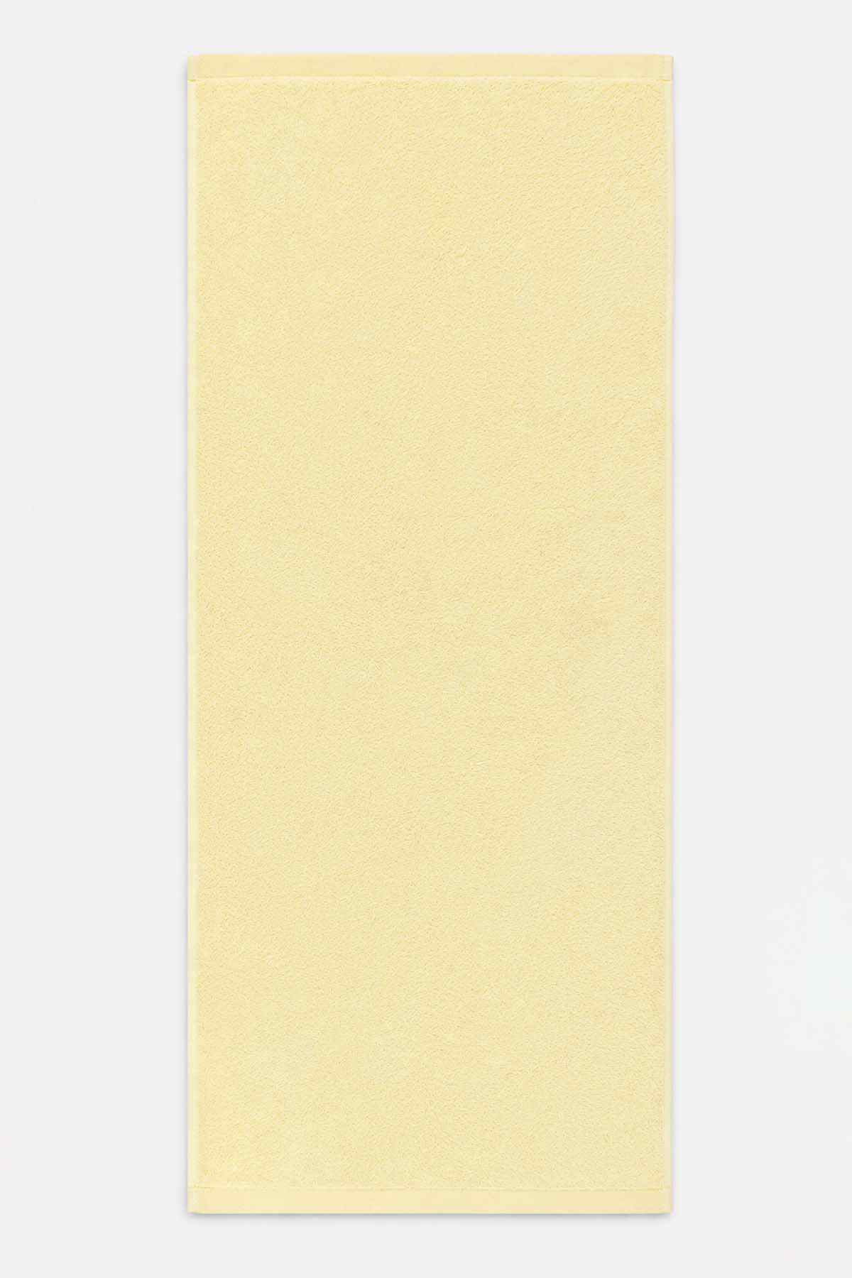 Yellow rectangular baby towel with simple stitched border