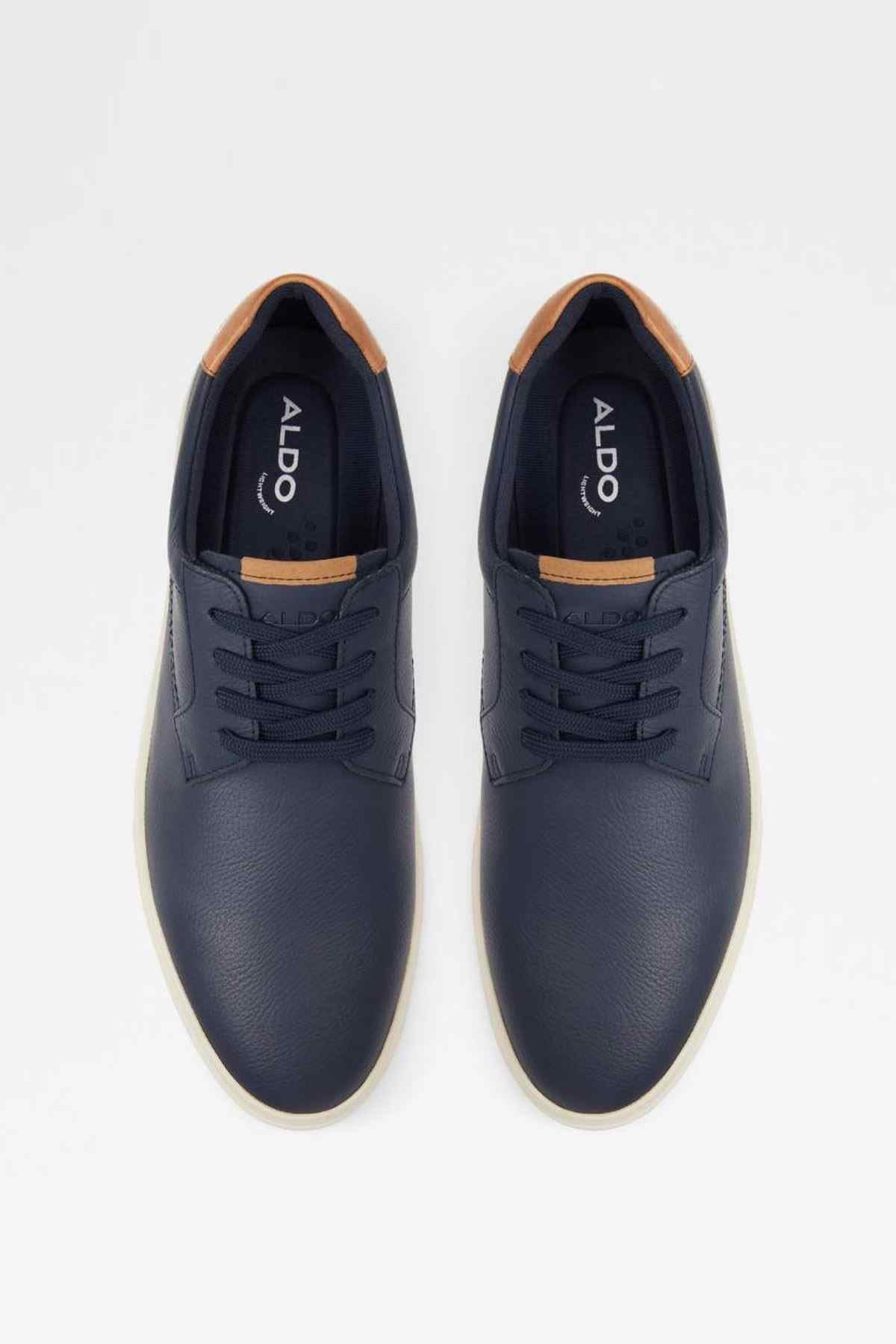 ALDO navy sneakers pair view, lace-up with tan-lined collar