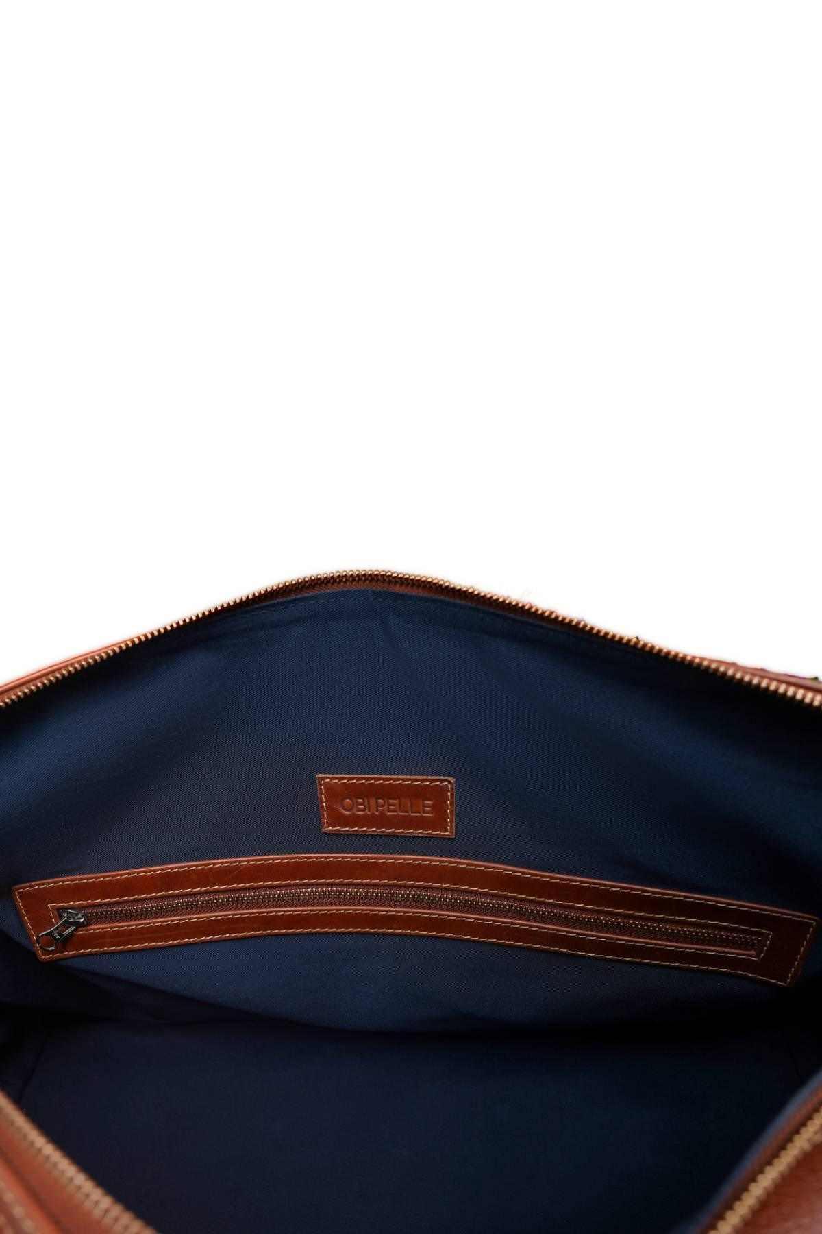 Obi Pelle - AK Galleria