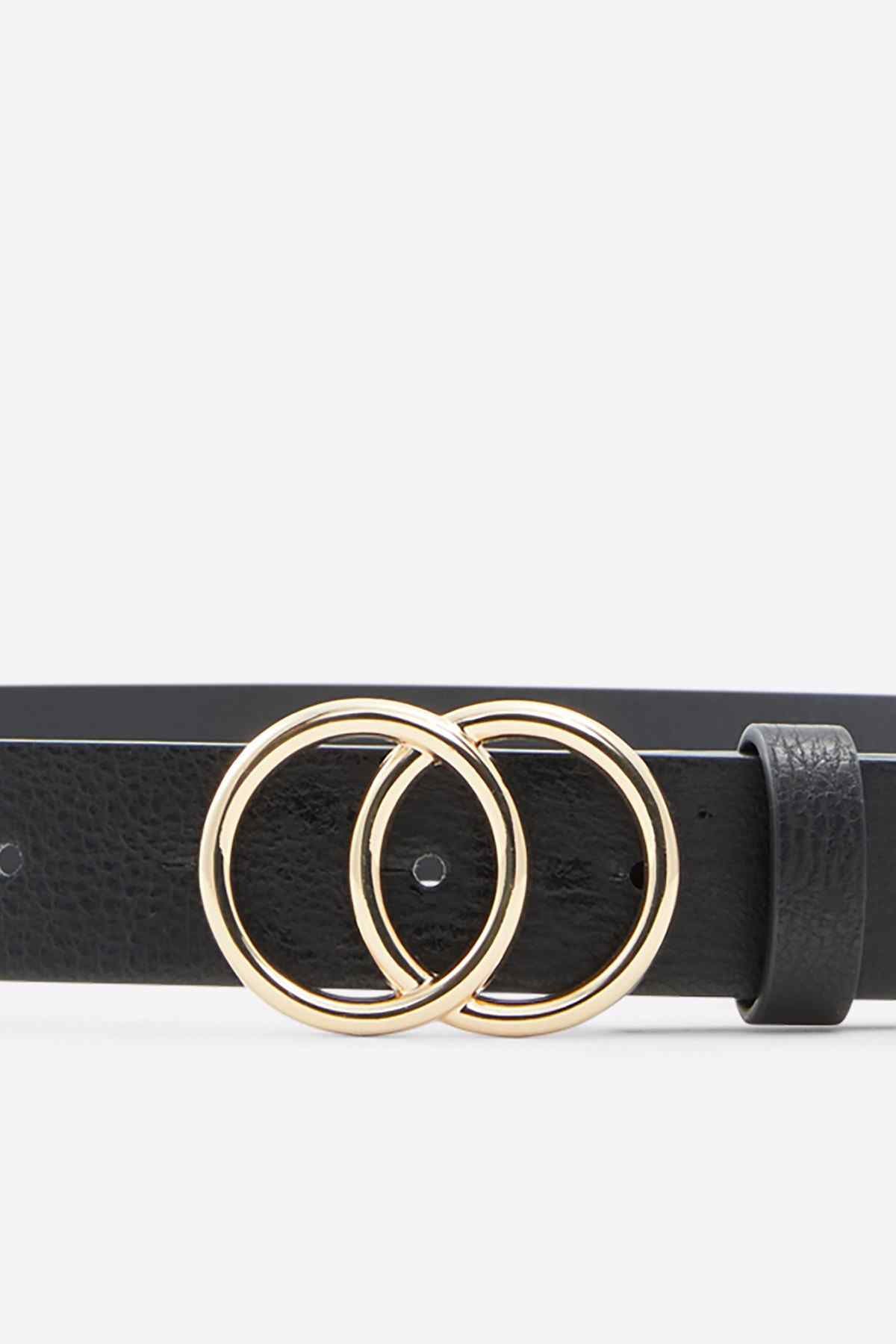 Black belt close-up with gold-tone double ring buckle and metal eyelets