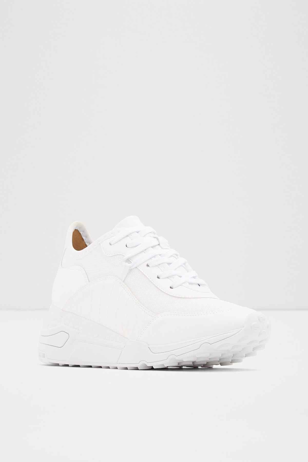 ALDO white lace-up sneaker, front 3/4 view with brown heel lining