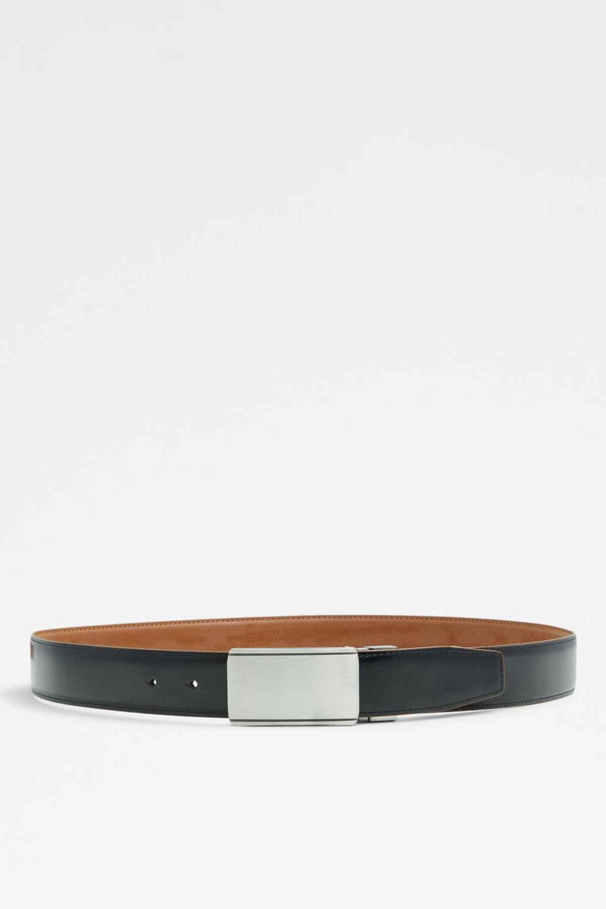 Cognac leather belt with dark underside, silver rectangular buckle, two adjustment holes