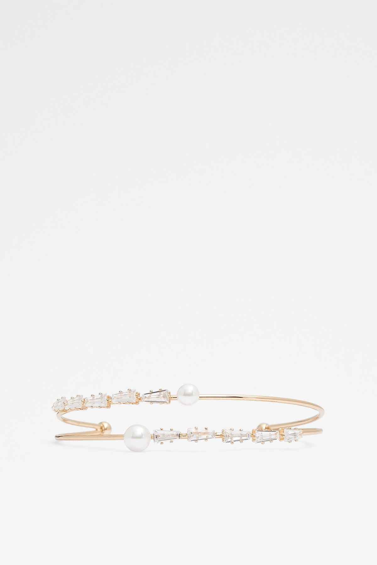 ALDO gold-tone bracelet with white pearls and rhinestone accents