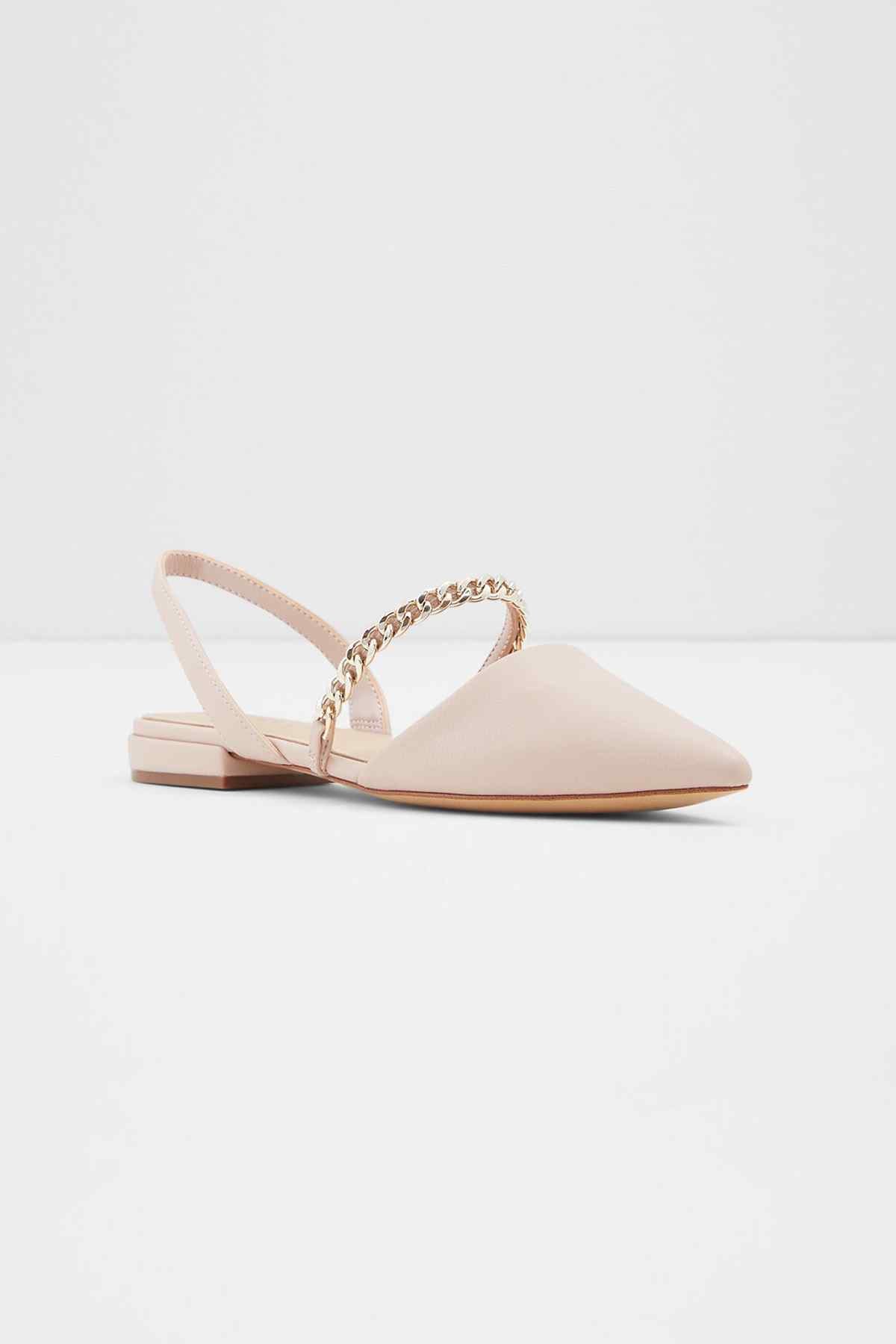 Light pink slingback mule sandal with chain-link strap and low block heel, angled view