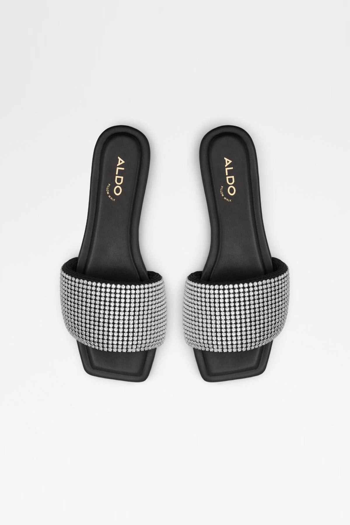 ALDO black slide sandals, pair view; rhinestone strap bands over flat soles.