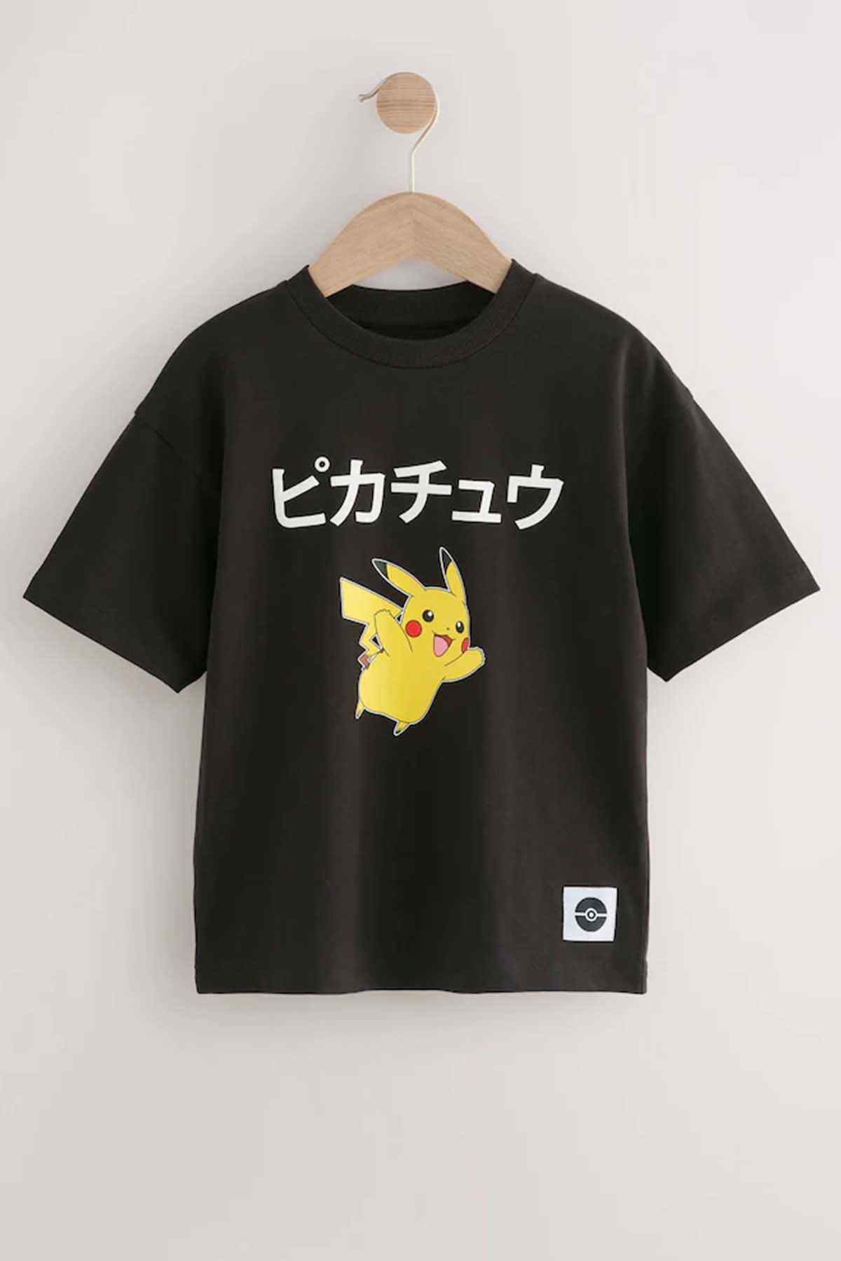 Black short-sleeve crewneck kids T-shirt with Pikachu graphic and small logo patch