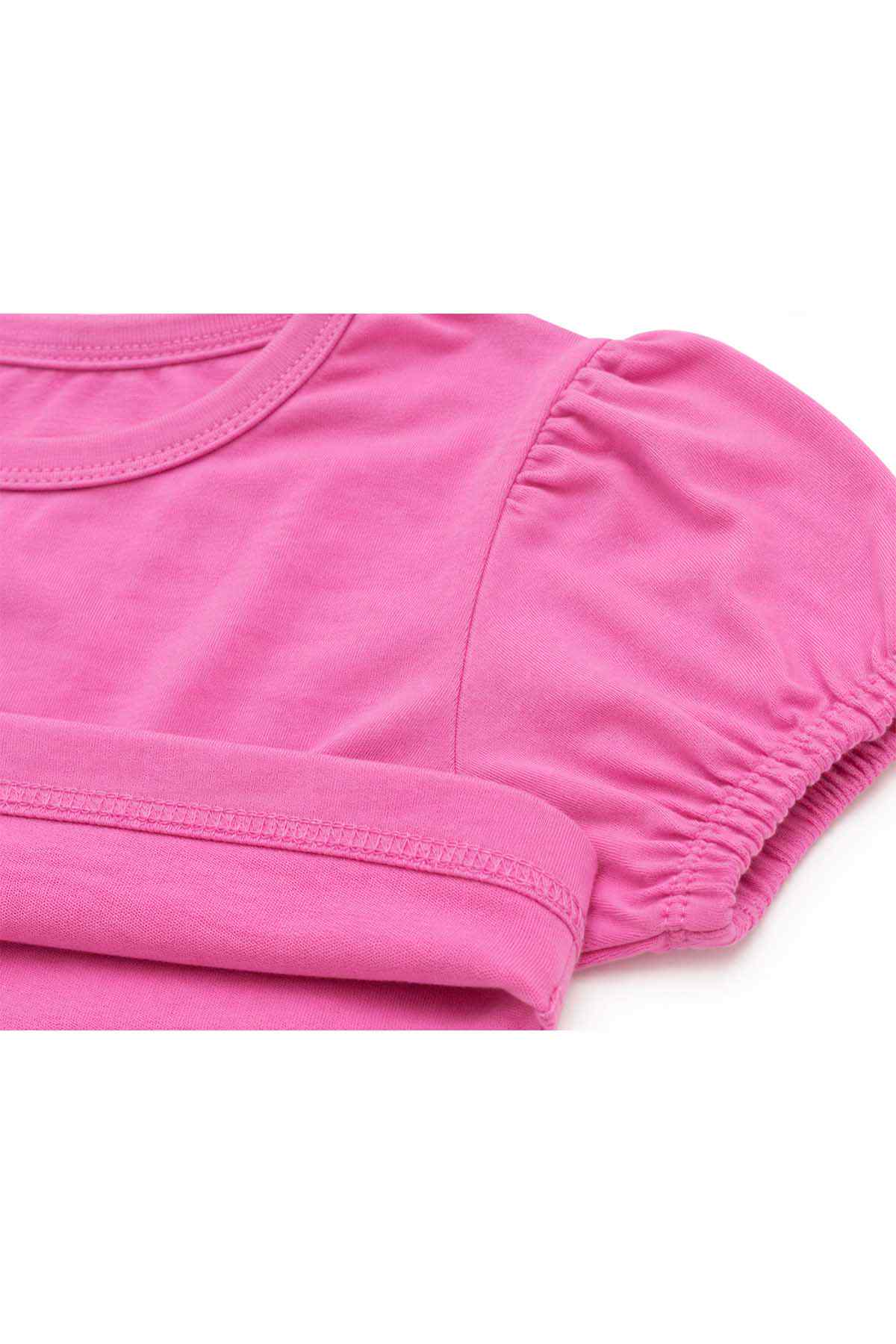 Pink T-shirt sleeve cuff detail with gathered ruffle and stitching