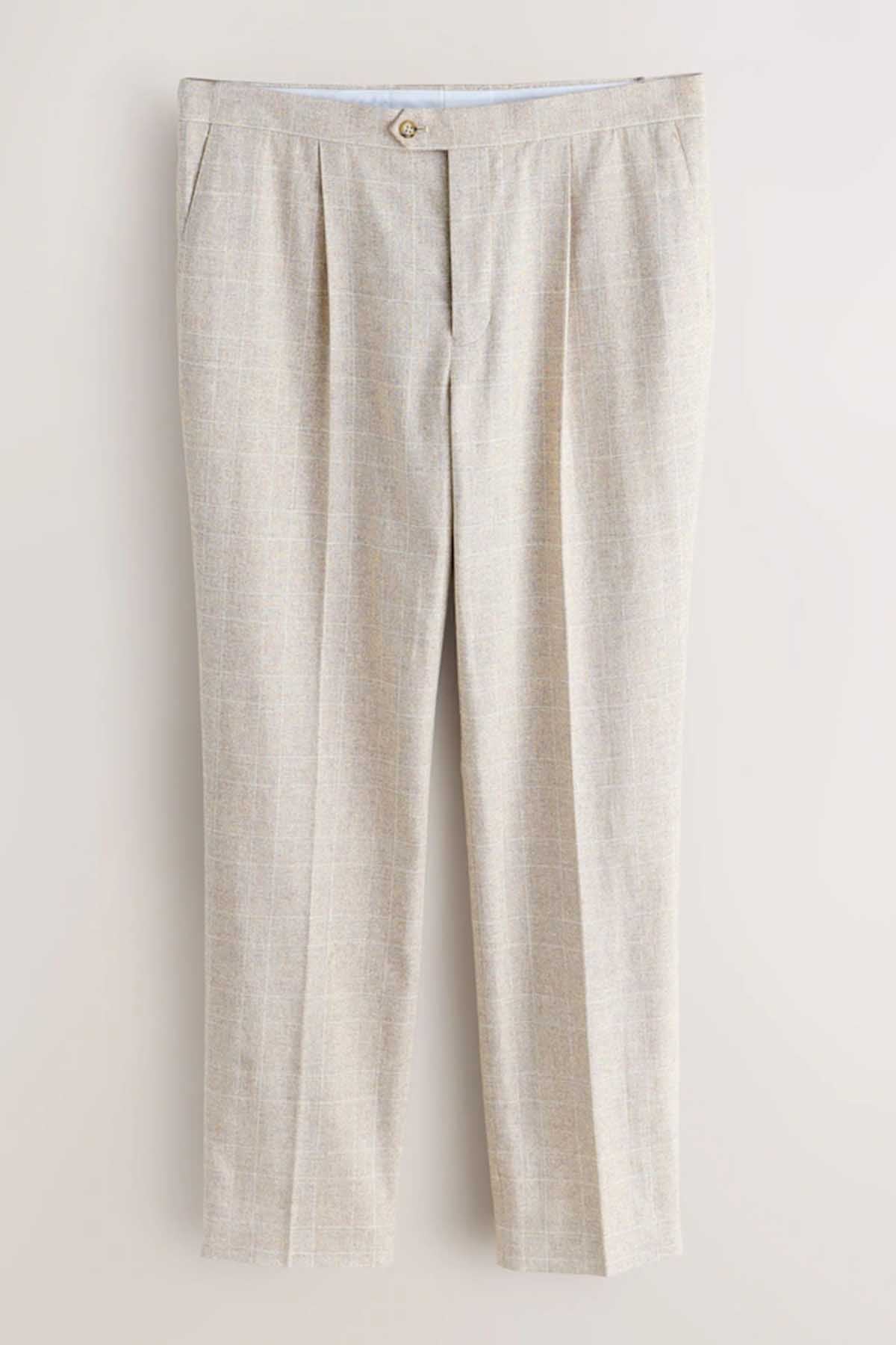Light beige suit trousers flat lay, front view with buttoned waistband