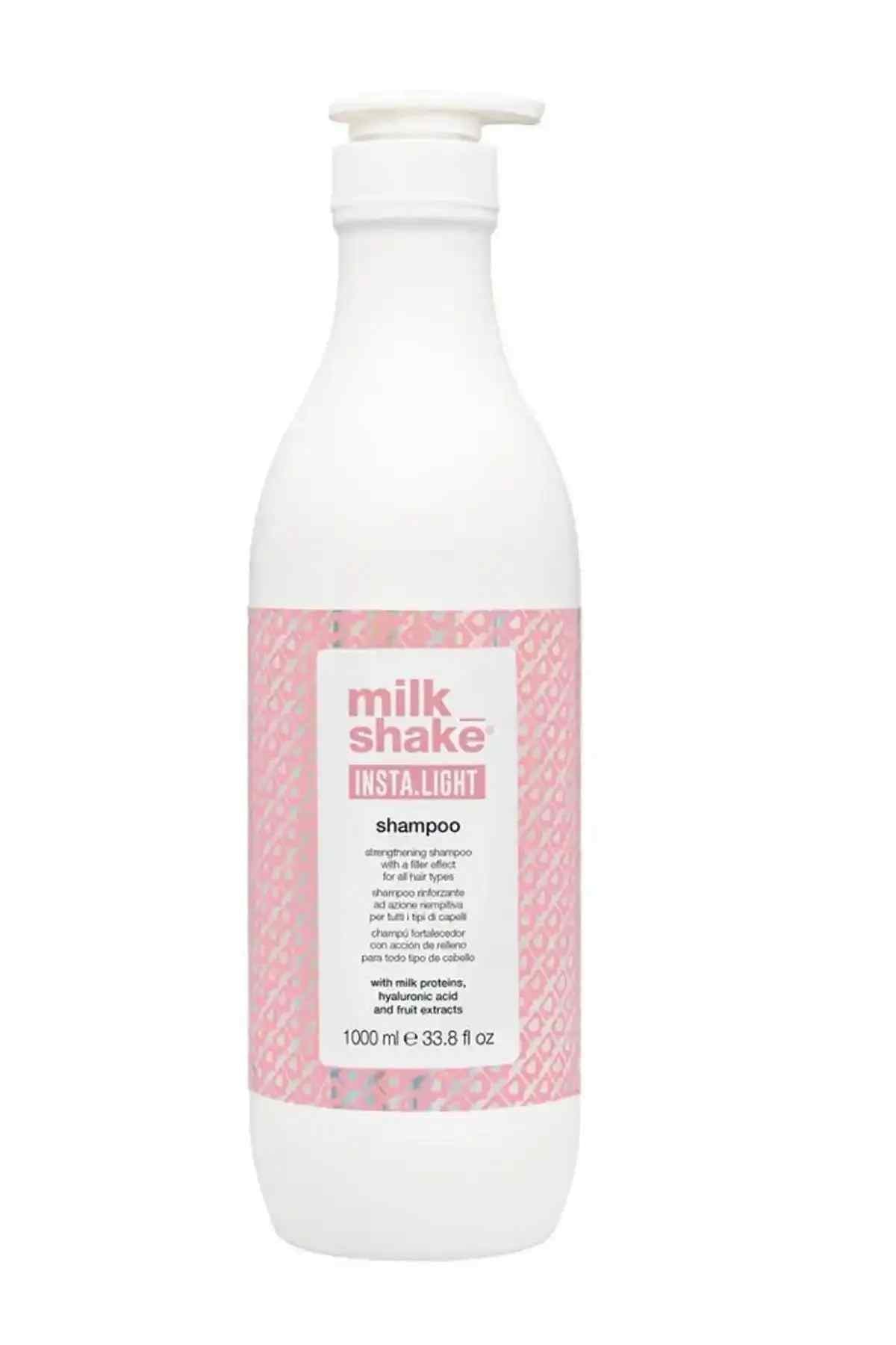 Milk_shake shampoo bottle with pink label on white plastic and flip-top cap