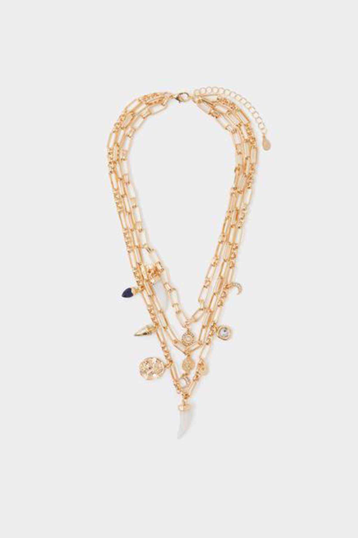 Gold-tone layered charm necklace with coin pendants and dangling drops