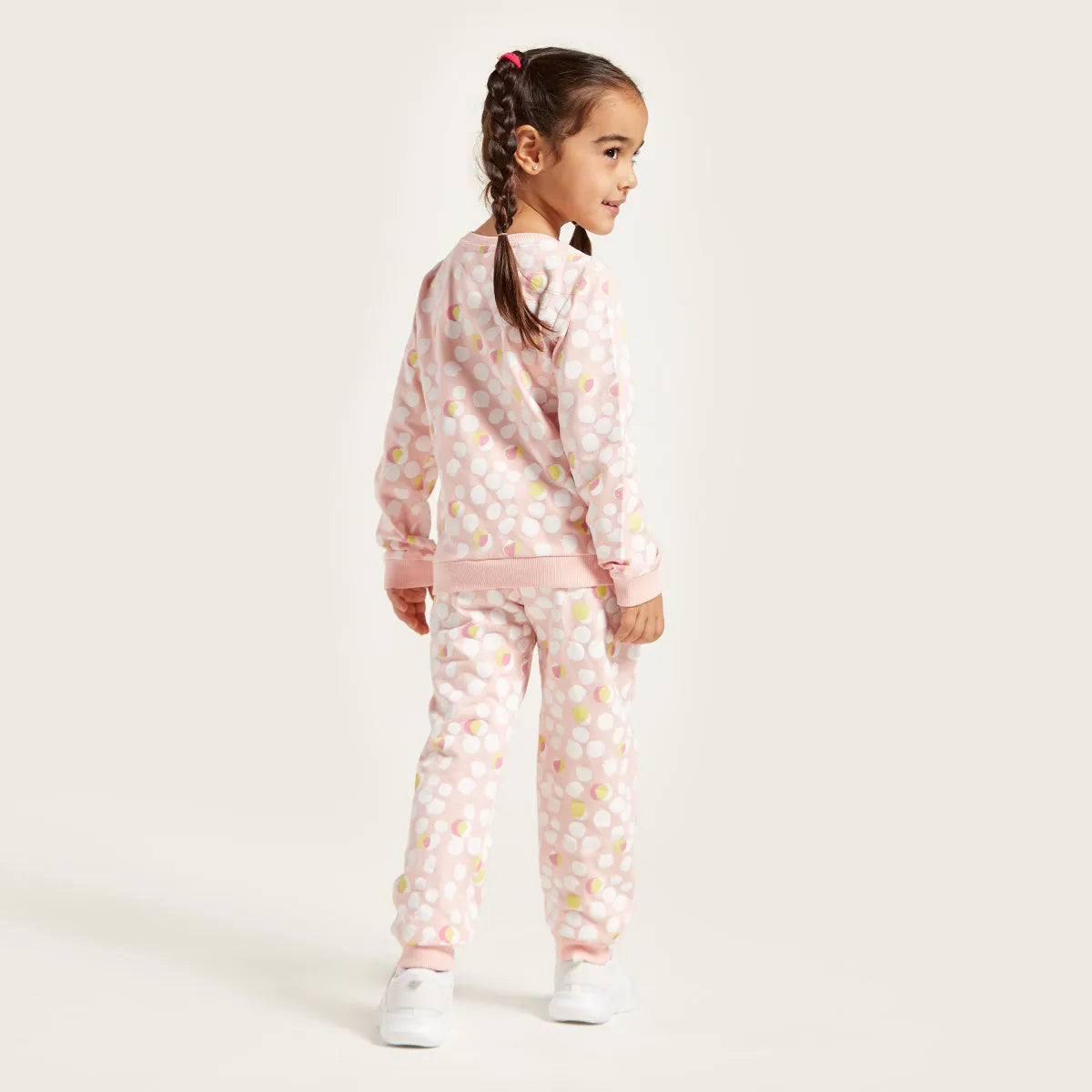Pink baby hoodie and jogger pants set with multicolor dot print, side view