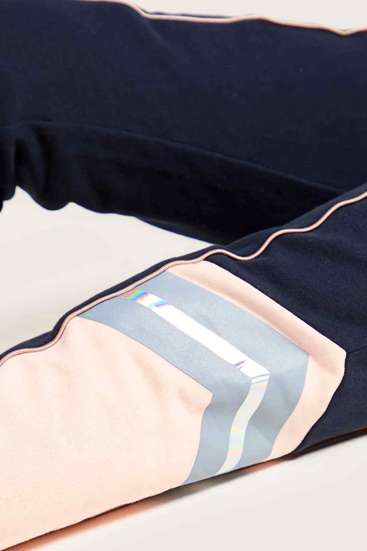 Blue kids jogger pants with contrast trim and striped lining detail