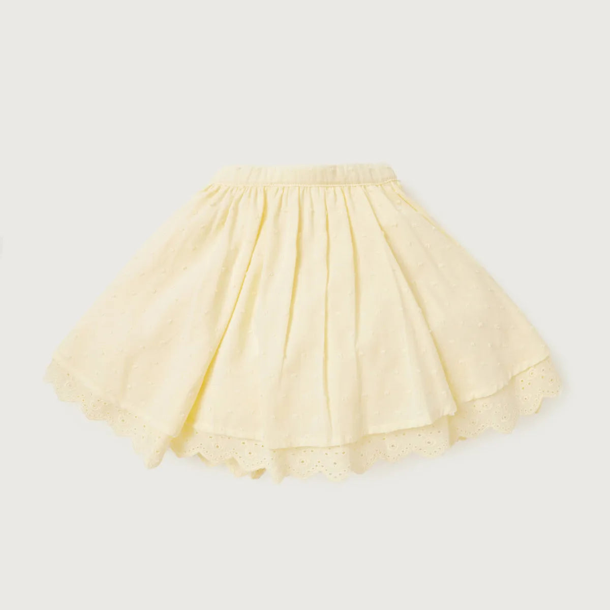 Yellow baby tiered skirt with gathered waistband and scalloped hem