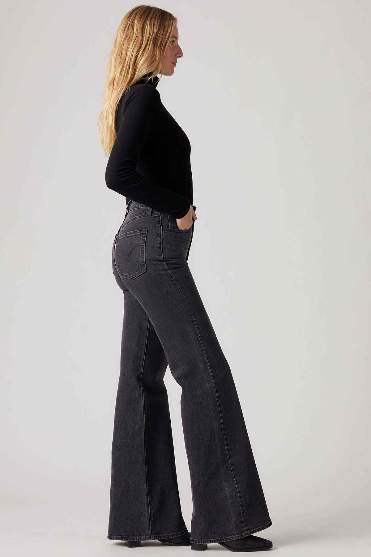 Levi's black bootcut jeans side view with straight flare leg and stitched seams