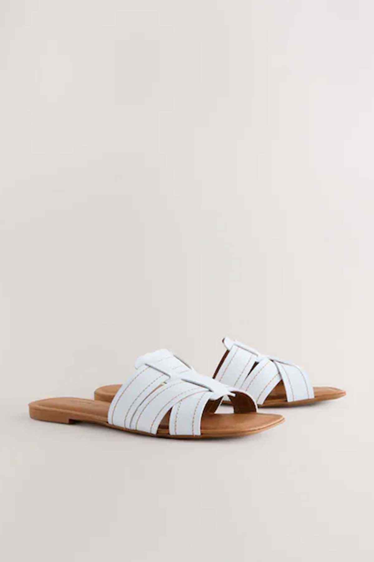 NEXT white slide sandals with tan sole and stitched crisscross straps