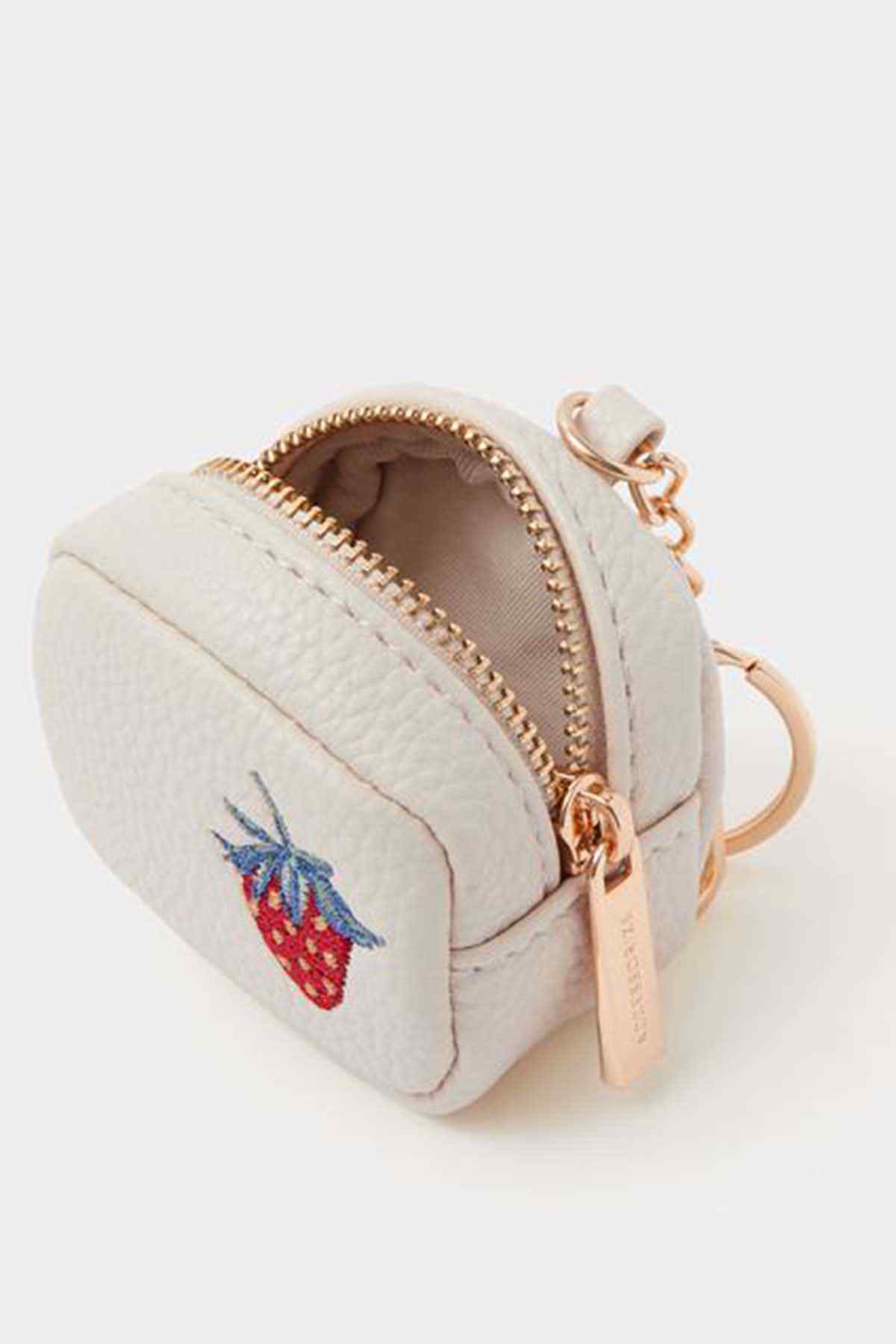 Cream fabric zip pouch keychain with embroidered strawberry and rose-gold zipper