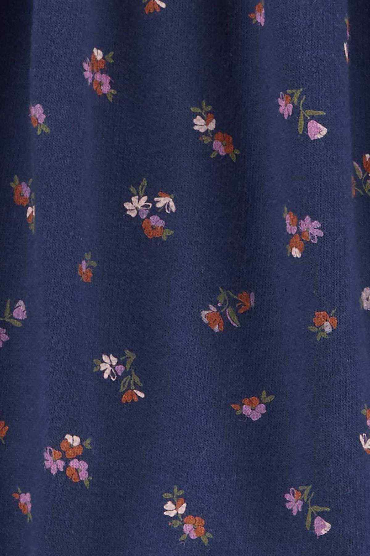 Navy floral fabric with small multicolor blossoms