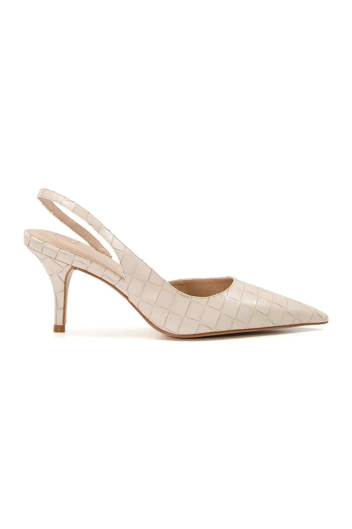 Ecru point-toe slingback high-heel pump with thin stiletto heel, front view