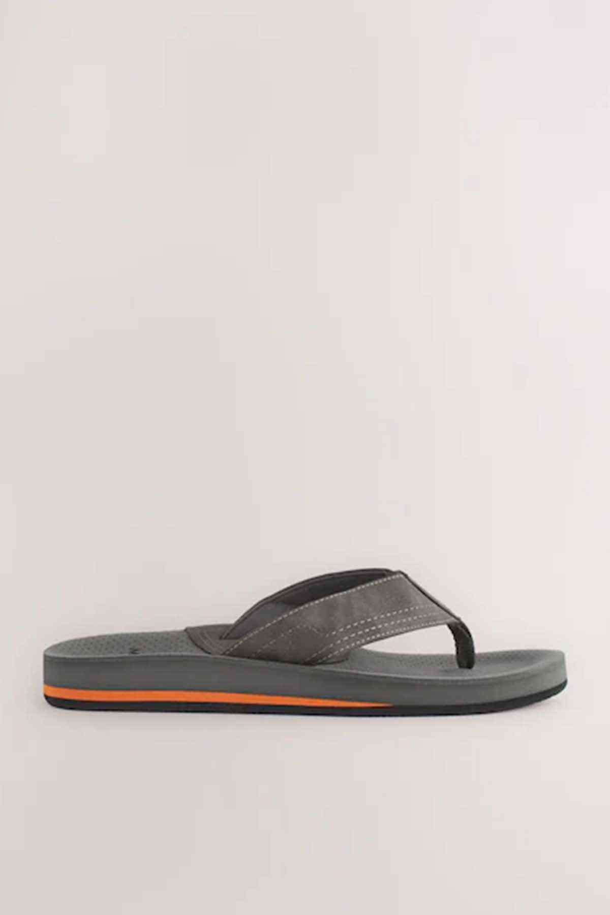 Grey single flip-flop with thong strap and orange-trim sole