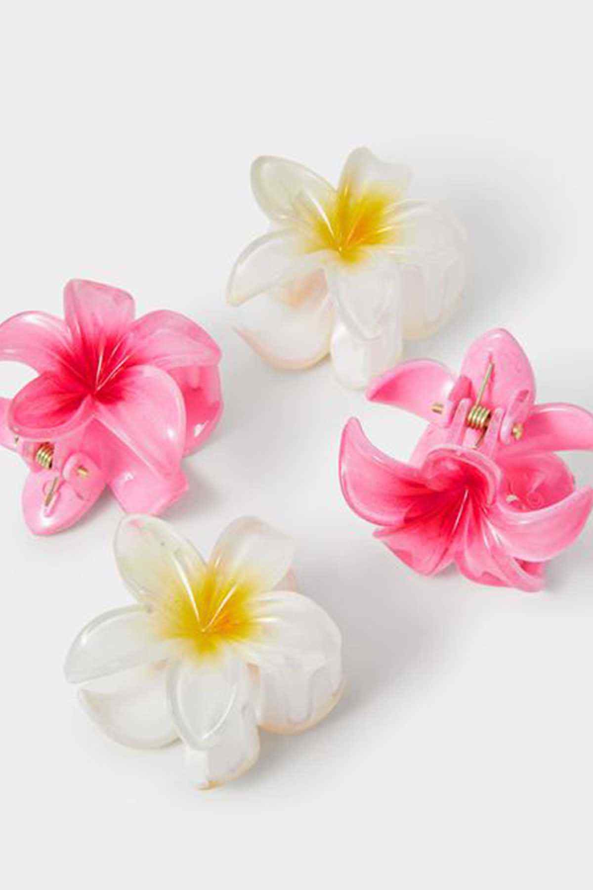 Six flower hair clips in fuchsia and white with yellow centers
