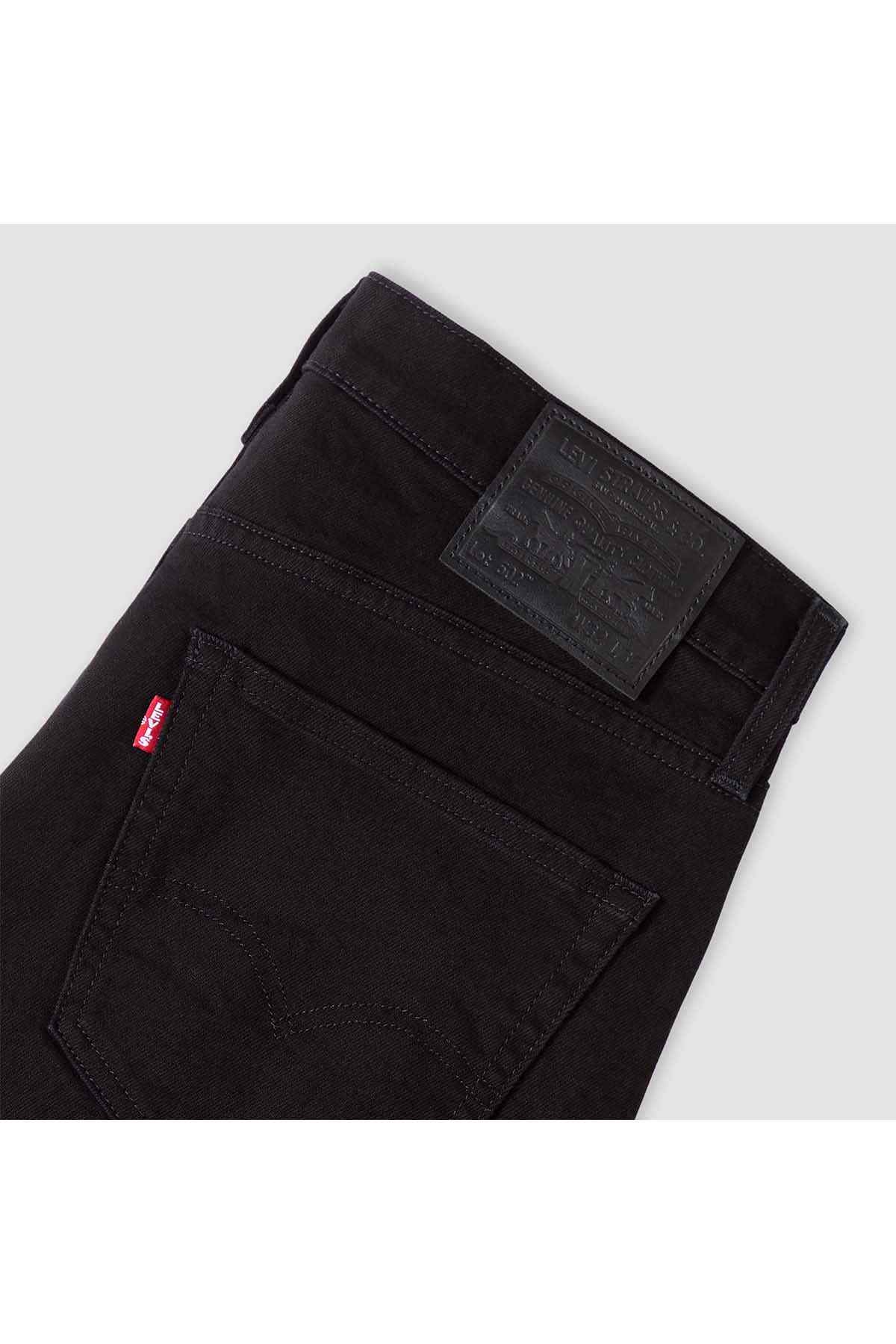 Black denim jeans with logo patch and stitched pocket