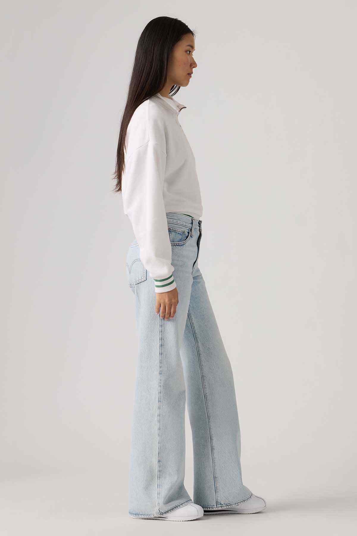 Levi's light indigo denim jeans, side view with classic five-pocket styling
