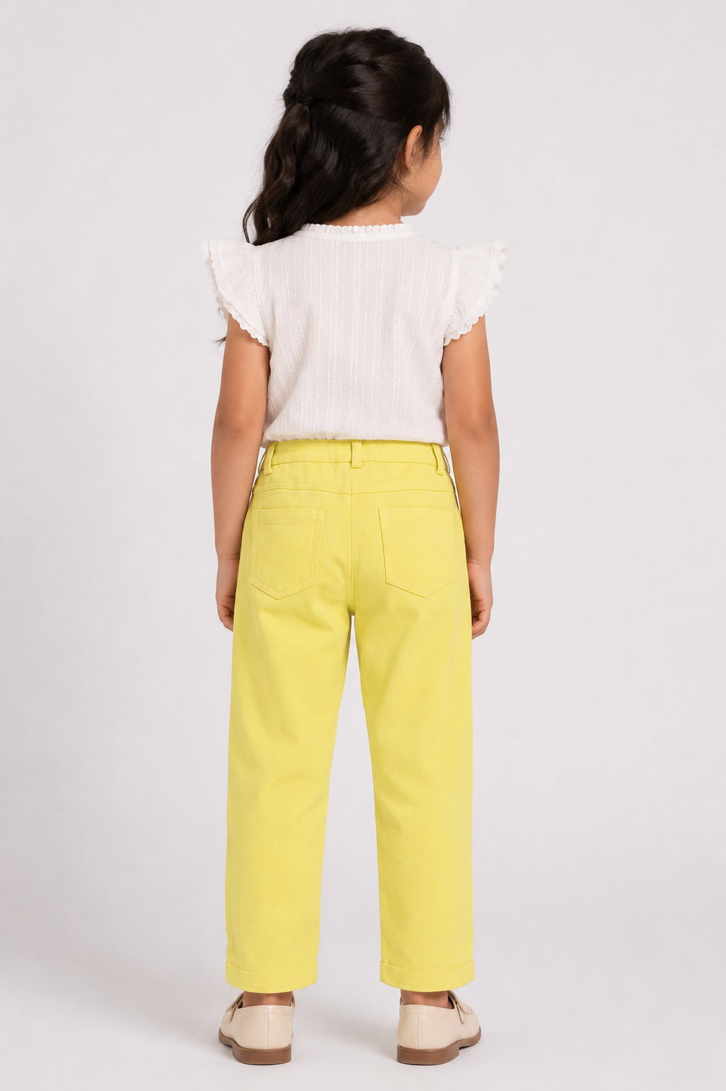 Yellow baby trousers with stitched back, belt loops, and ankle-length hem