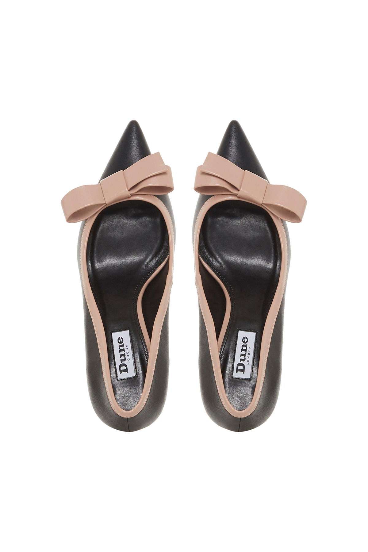 Pair of black pointed-toe stiletto heels with pale pink bows and Dune tags